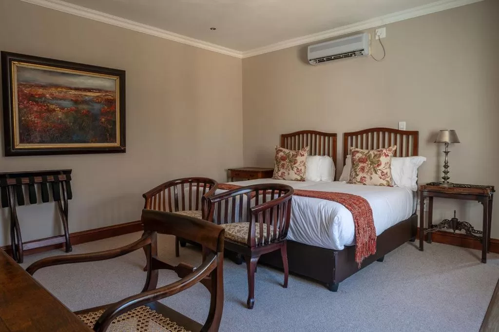 Bed in Issaquena Heights Boutique Hotel