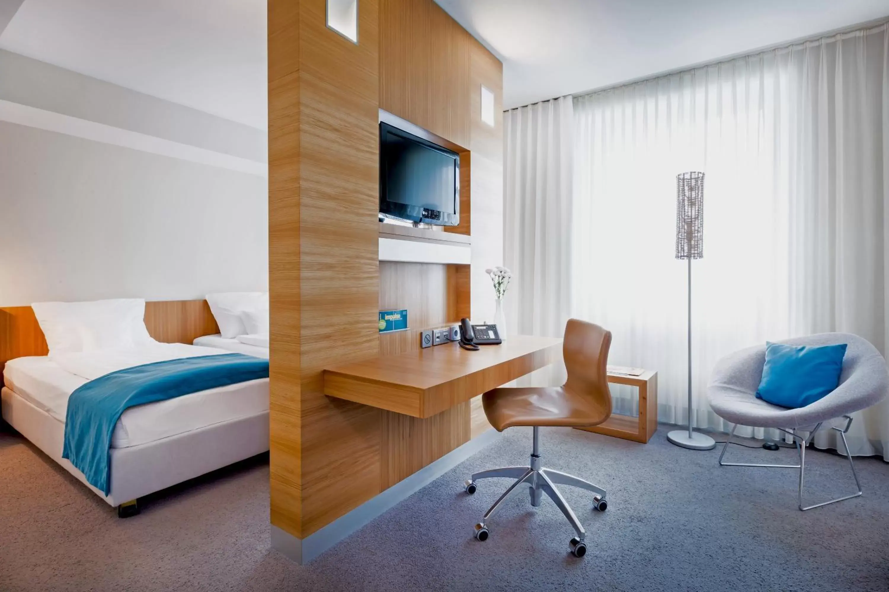 Photo of the whole room, Bed in Lindner Hotel Berlin Ku'damm, part of JdV by Hyatt