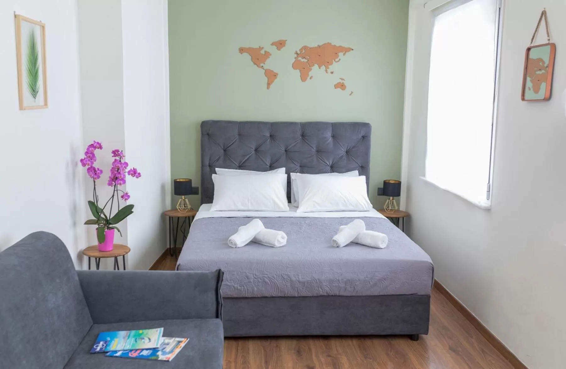 Seating area, Bed in The Athens Version Luxury Suites