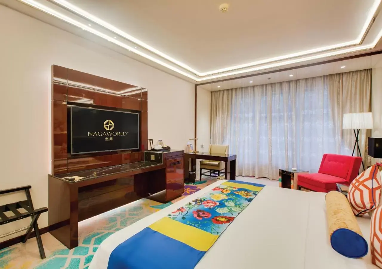 Bed, TV/Entertainment Center in NagaWorld Hotel & Entertainment Complex