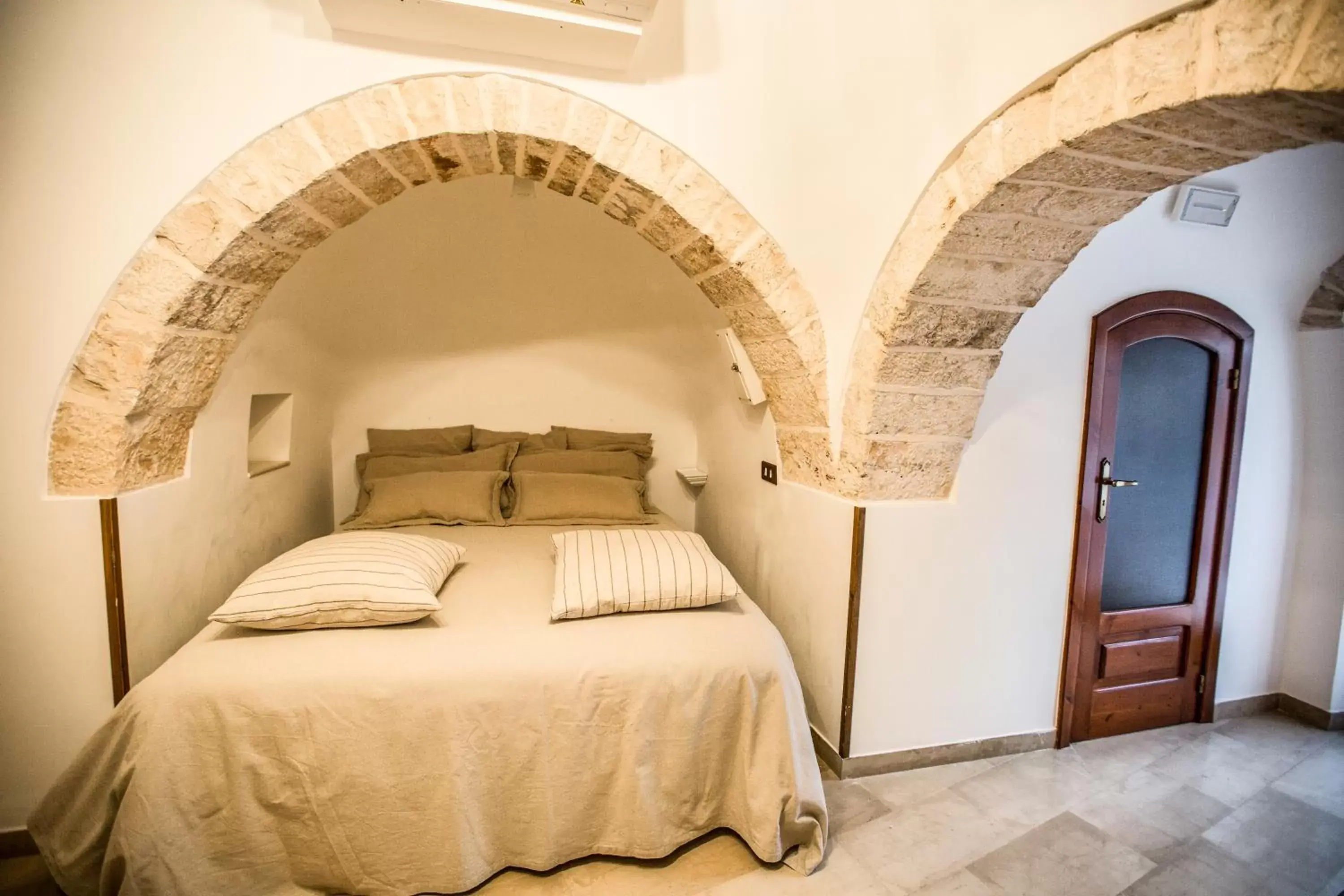 Bed in Trulli Antichi Mestieri - Widespread Trulli in the historic center