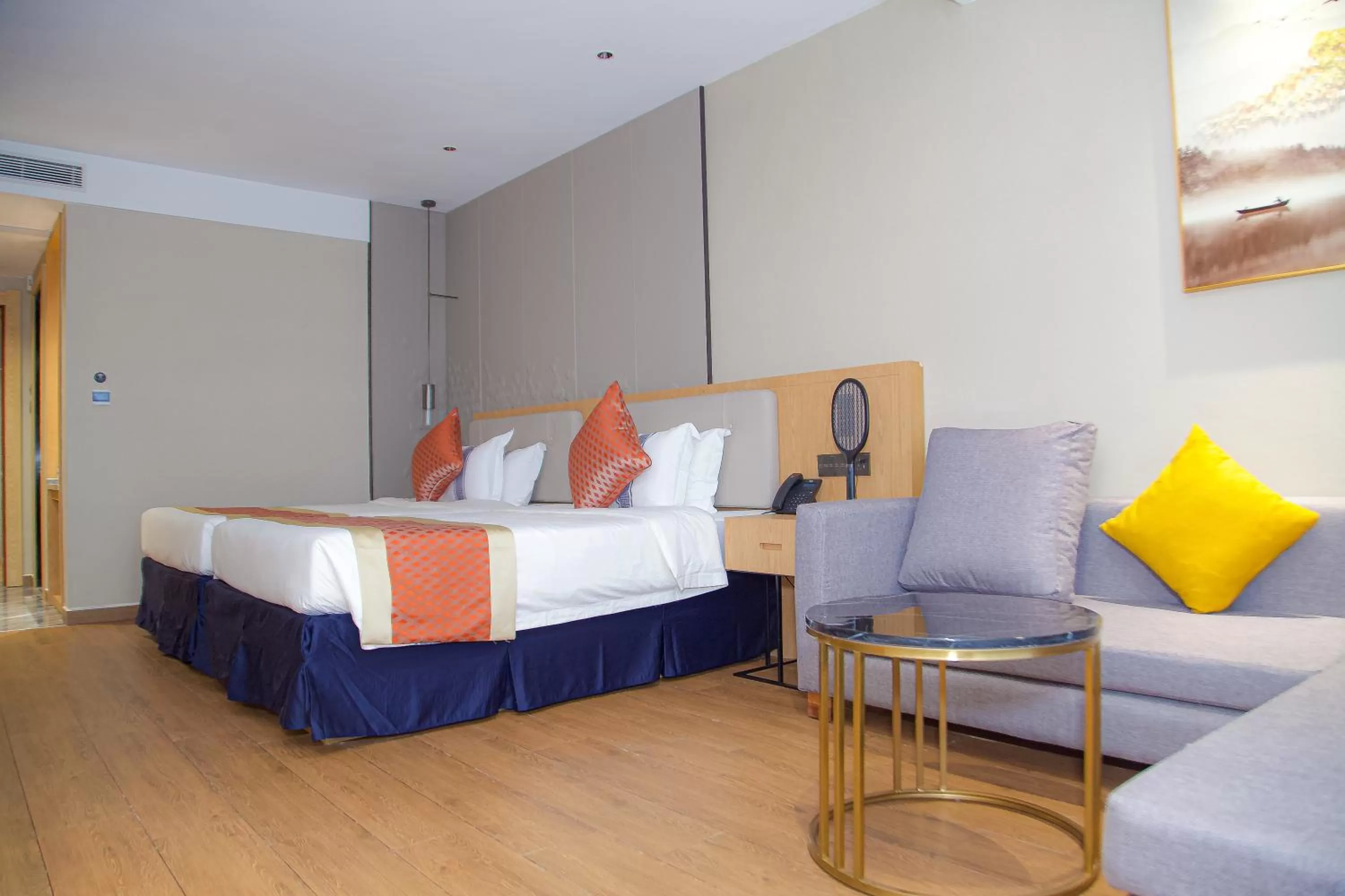 Photo of the whole room in Hôtel FAMILLE MONDIALE