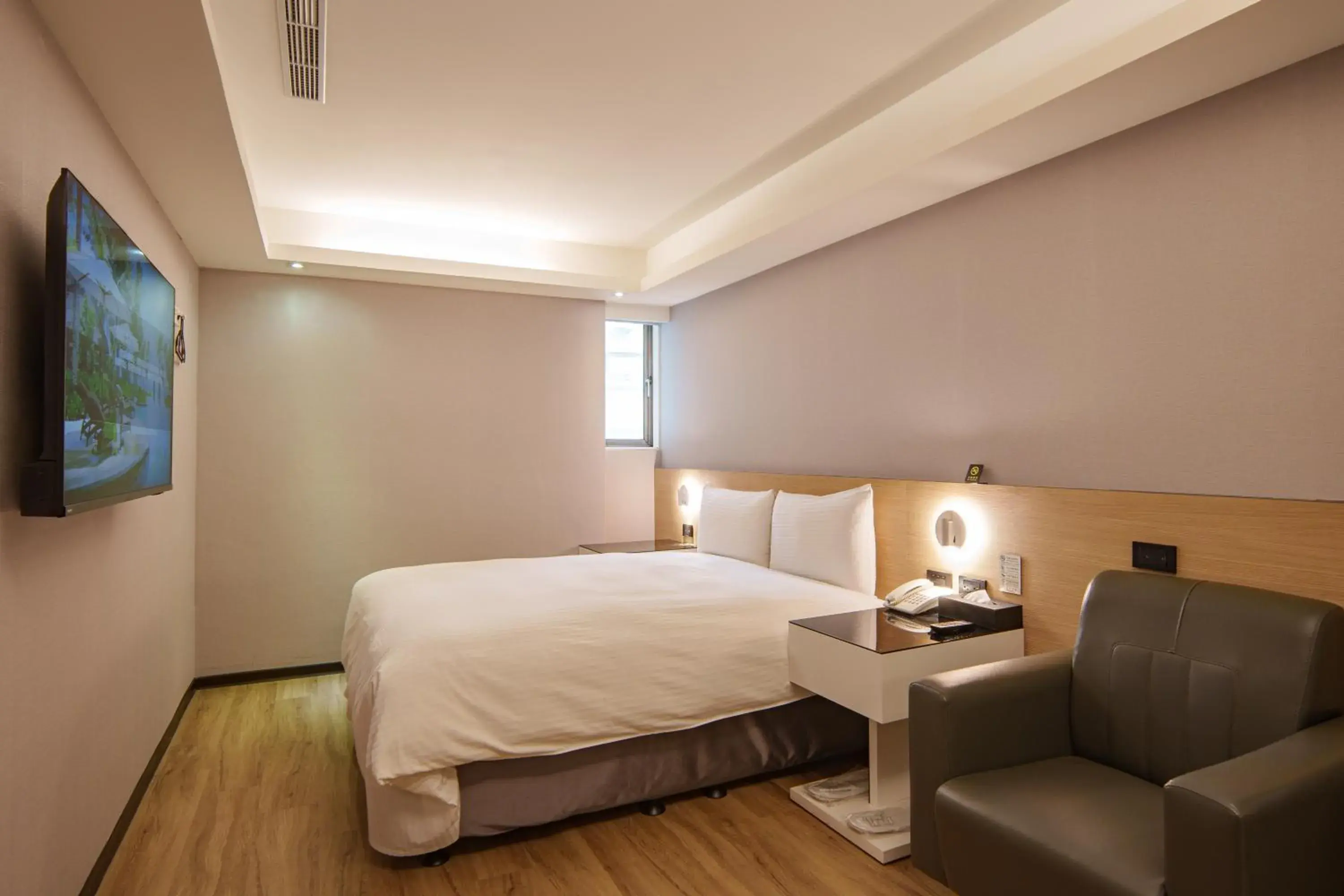 Bed in Hub Hotel Tucheng