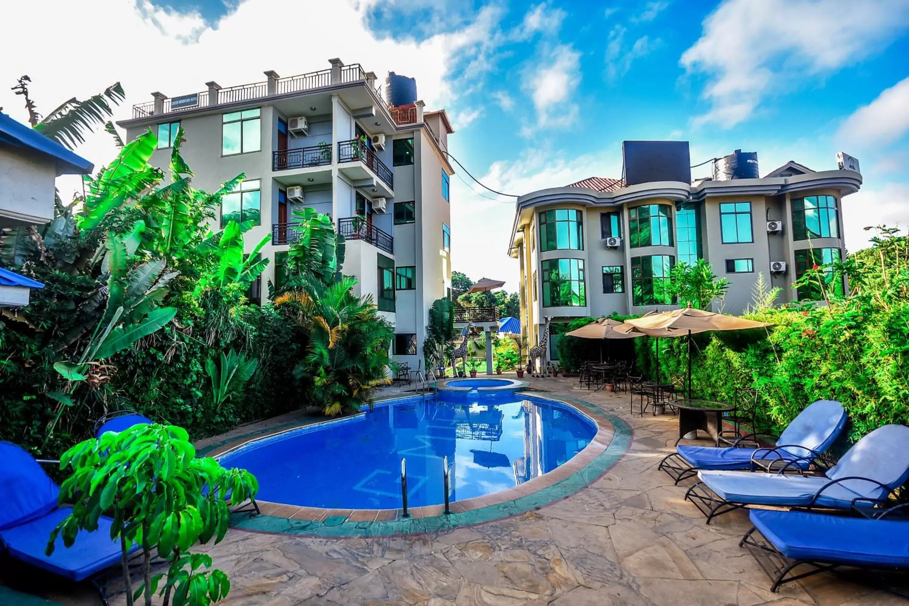 Swimming pool, Property Building in Green Mountain Hotel