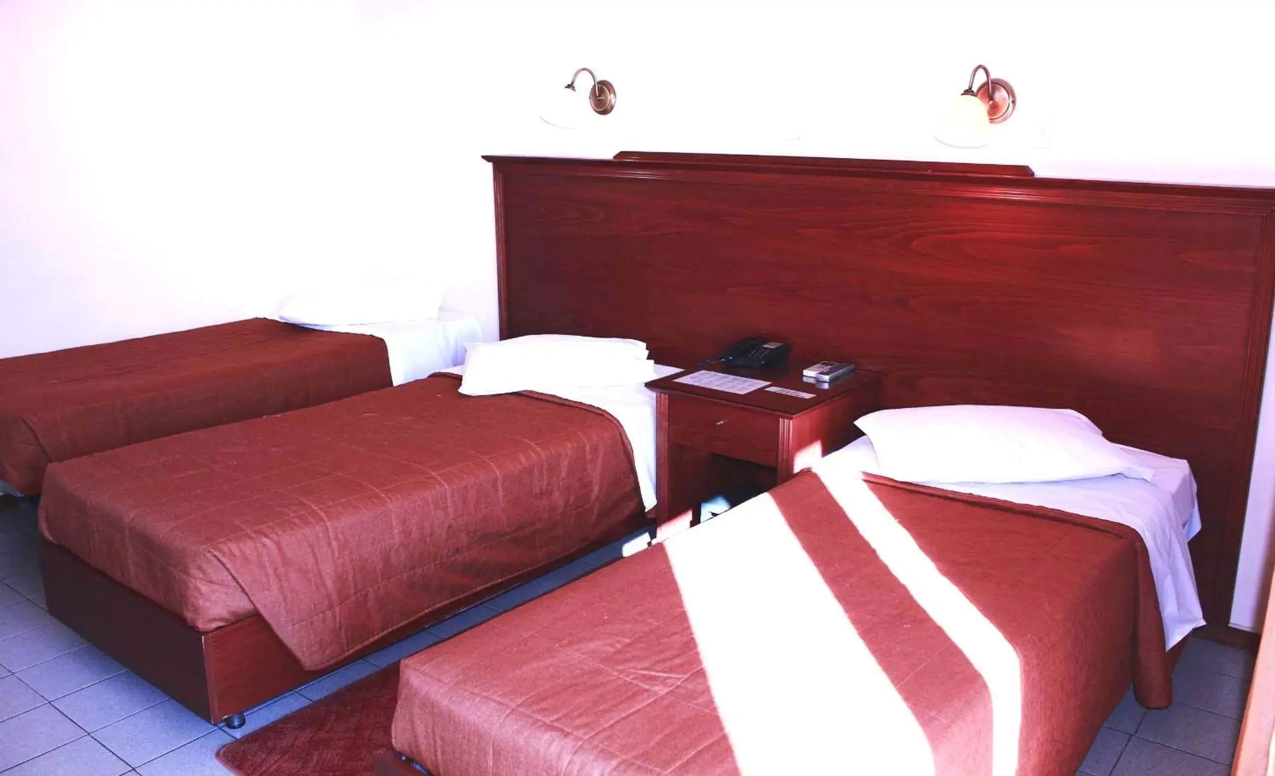 Bed in Apollo Hotel