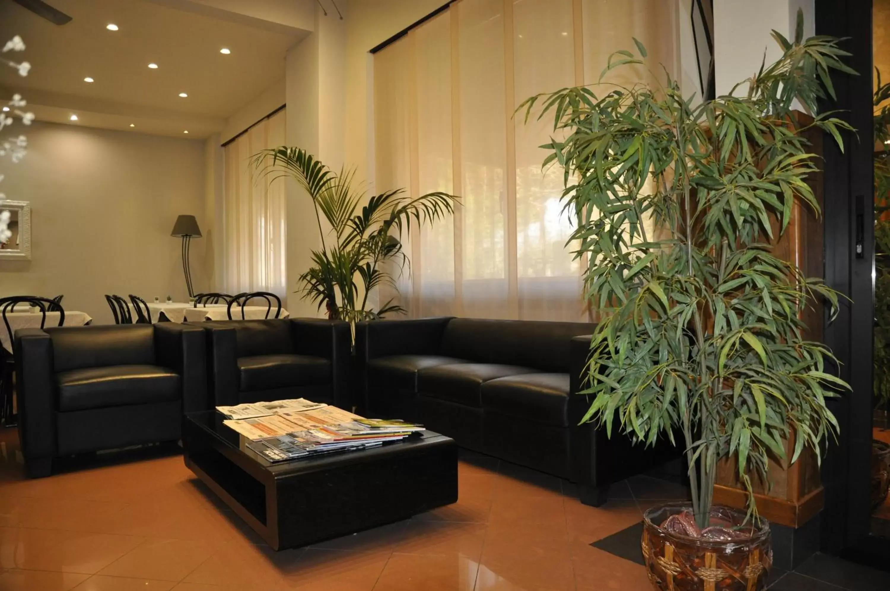 Communal lounge/ TV room, Lobby/Reception in Hotel Est Piombino