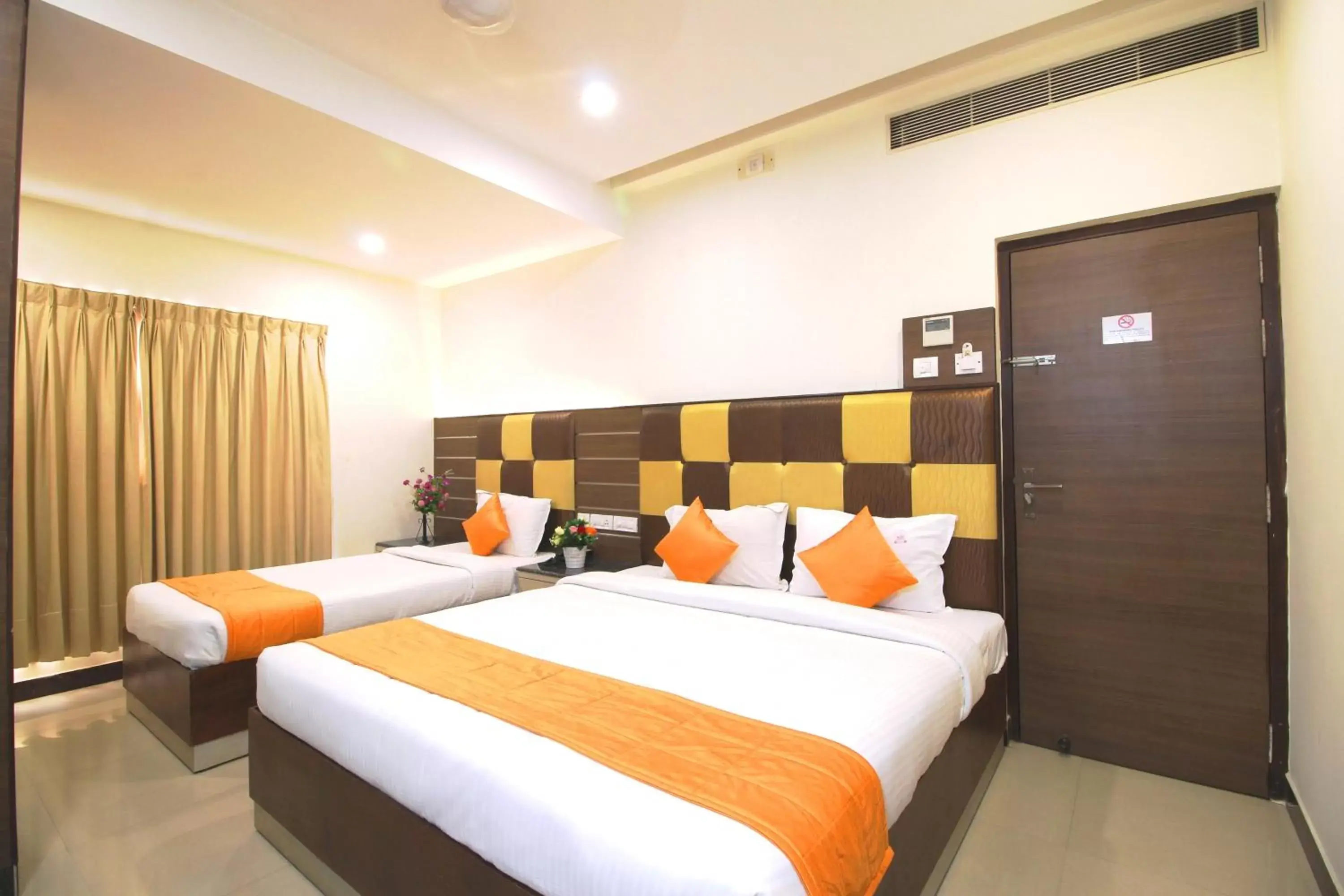 Bed in Saibala Grand Airport Hotel