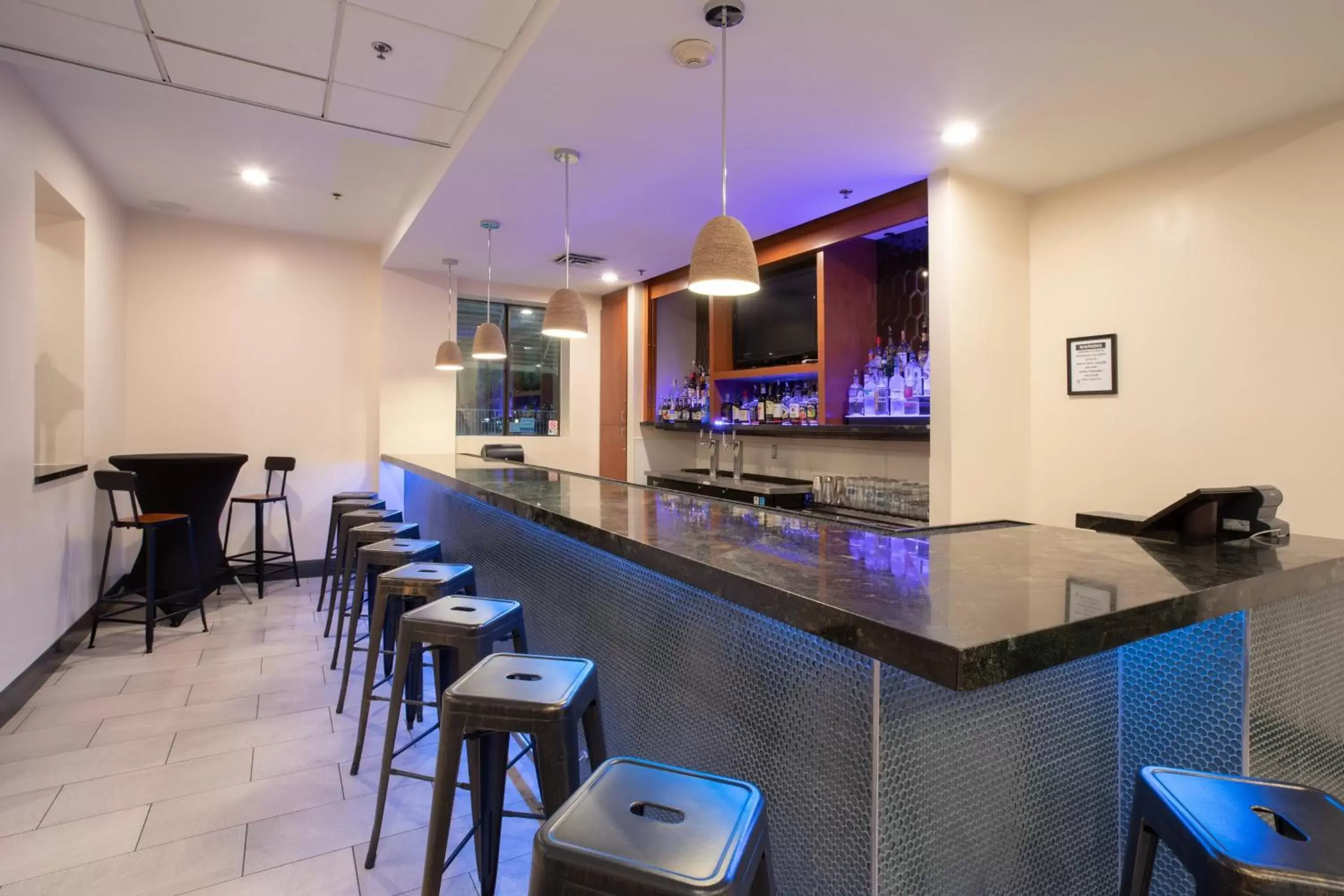 Lounge or bar, Lounge/Bar in Holiday Inn Hotels and Suites Goodyear - West Phoenix Area, an IHG Hotel