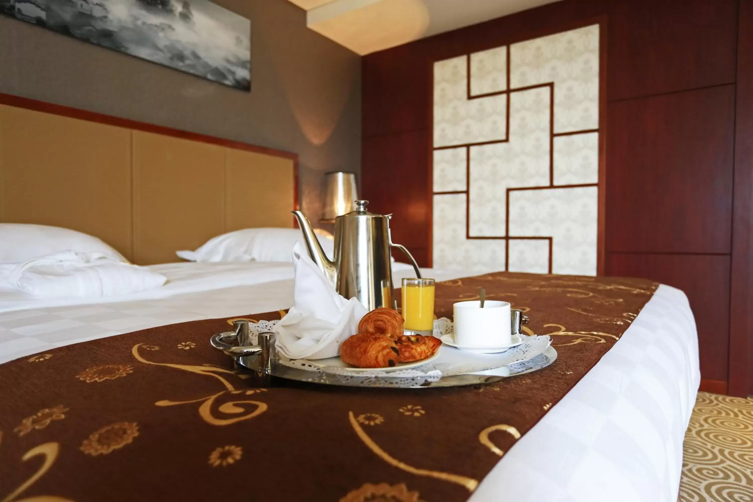 Bed in Hôtel Huatian Chinagora