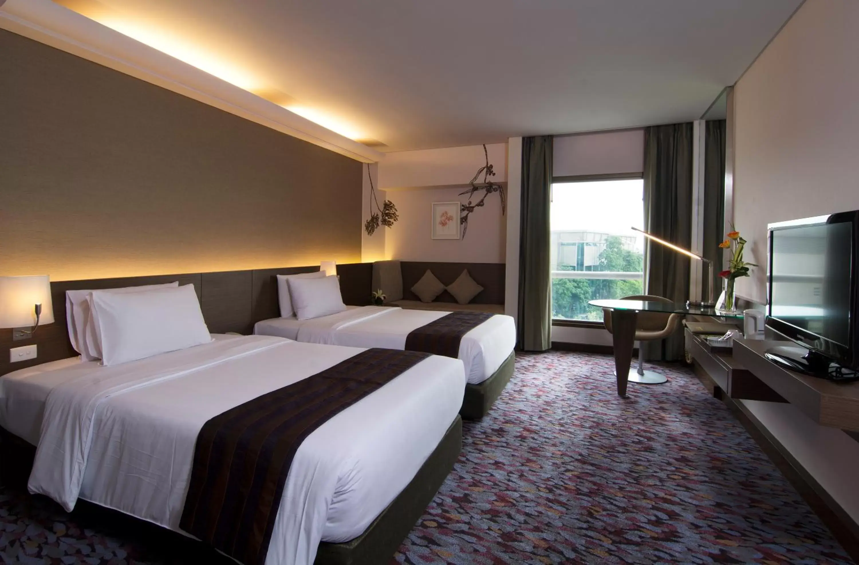 Bedroom in Rama Gardens Hotel Bangkok - SHA Plus Certified