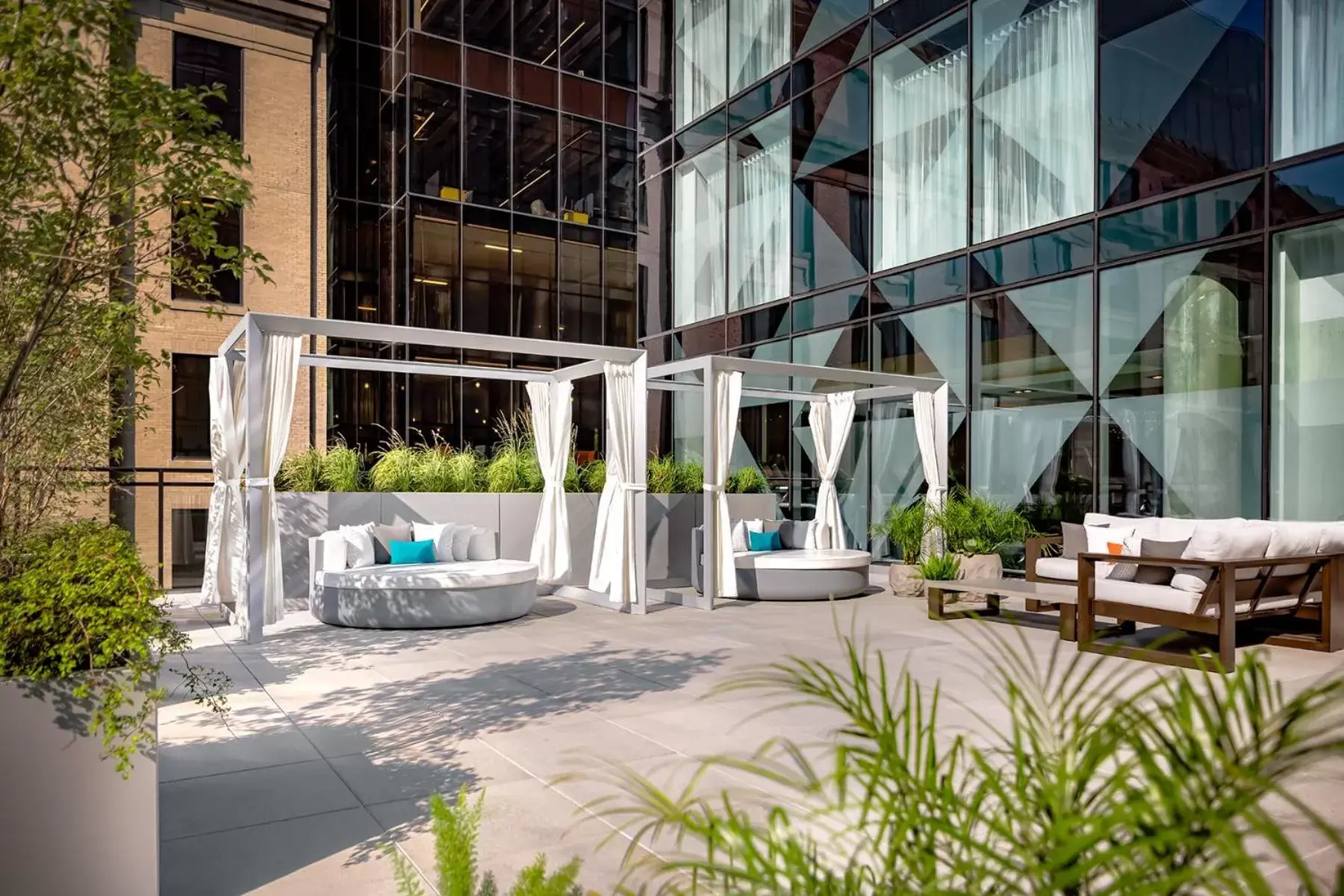 Patio in Humaniti Hotel Montreal, Autograph Collection