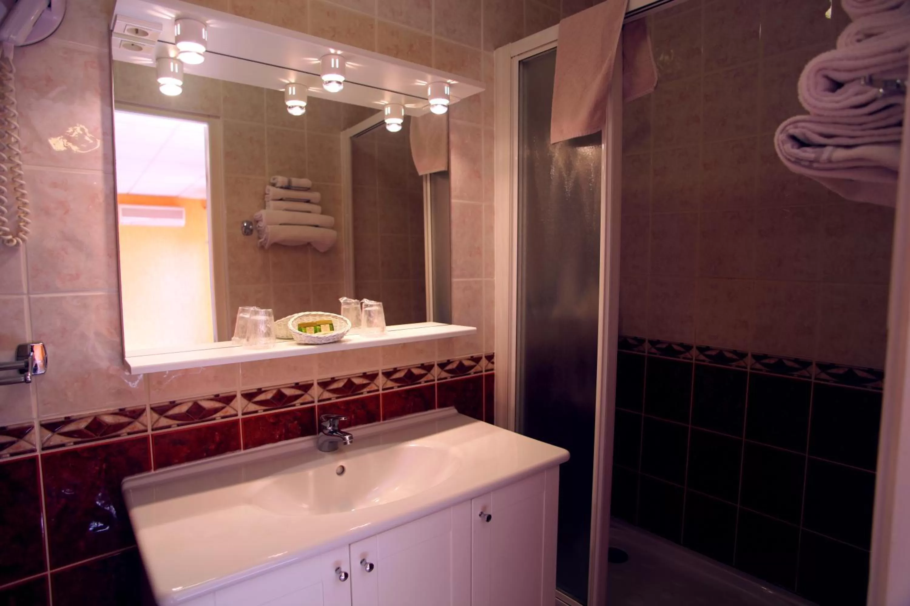 Bathroom in Logis Hotel Restaurant le Mirador