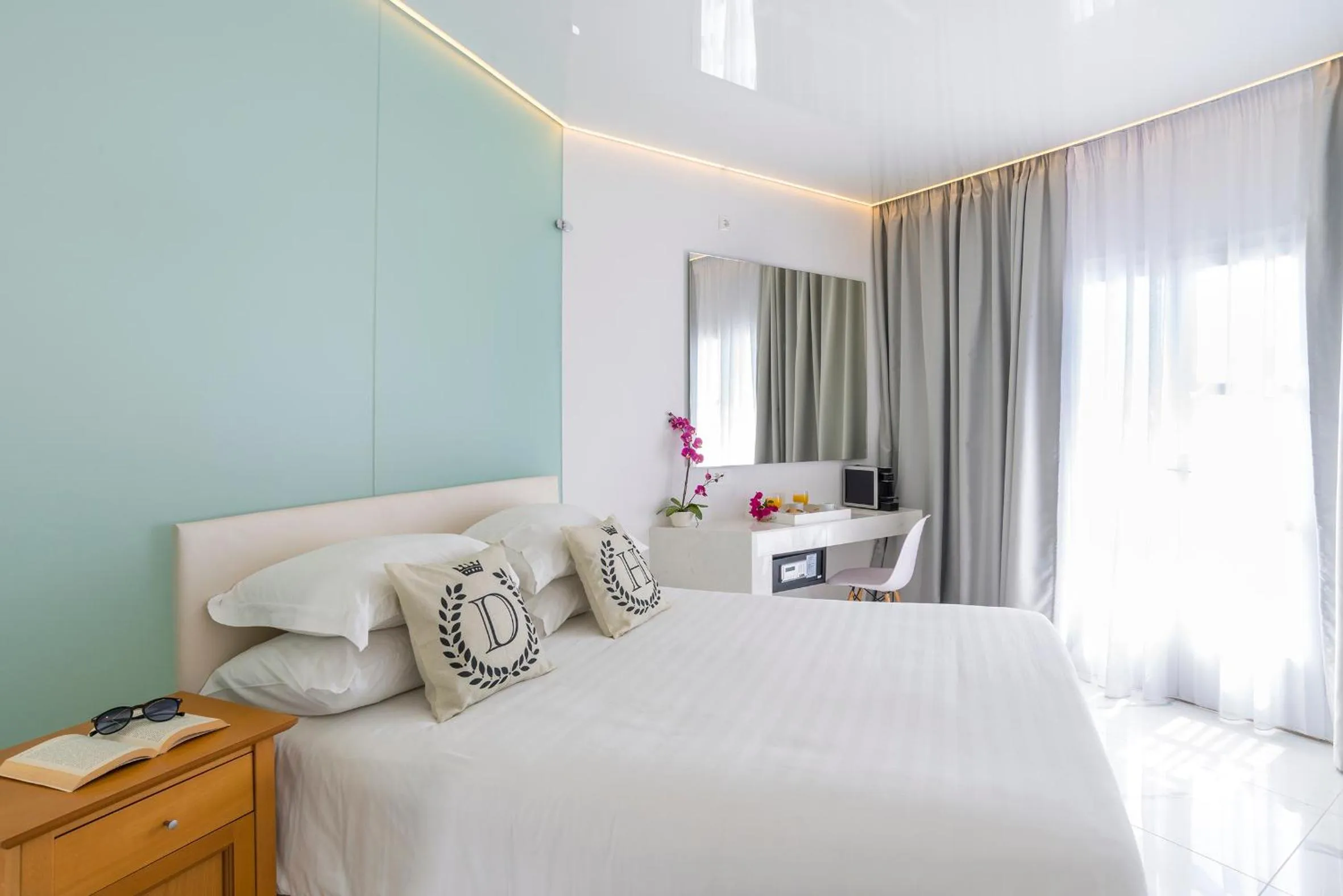 Bed in Dionysos Luxury Hotel Mykonos