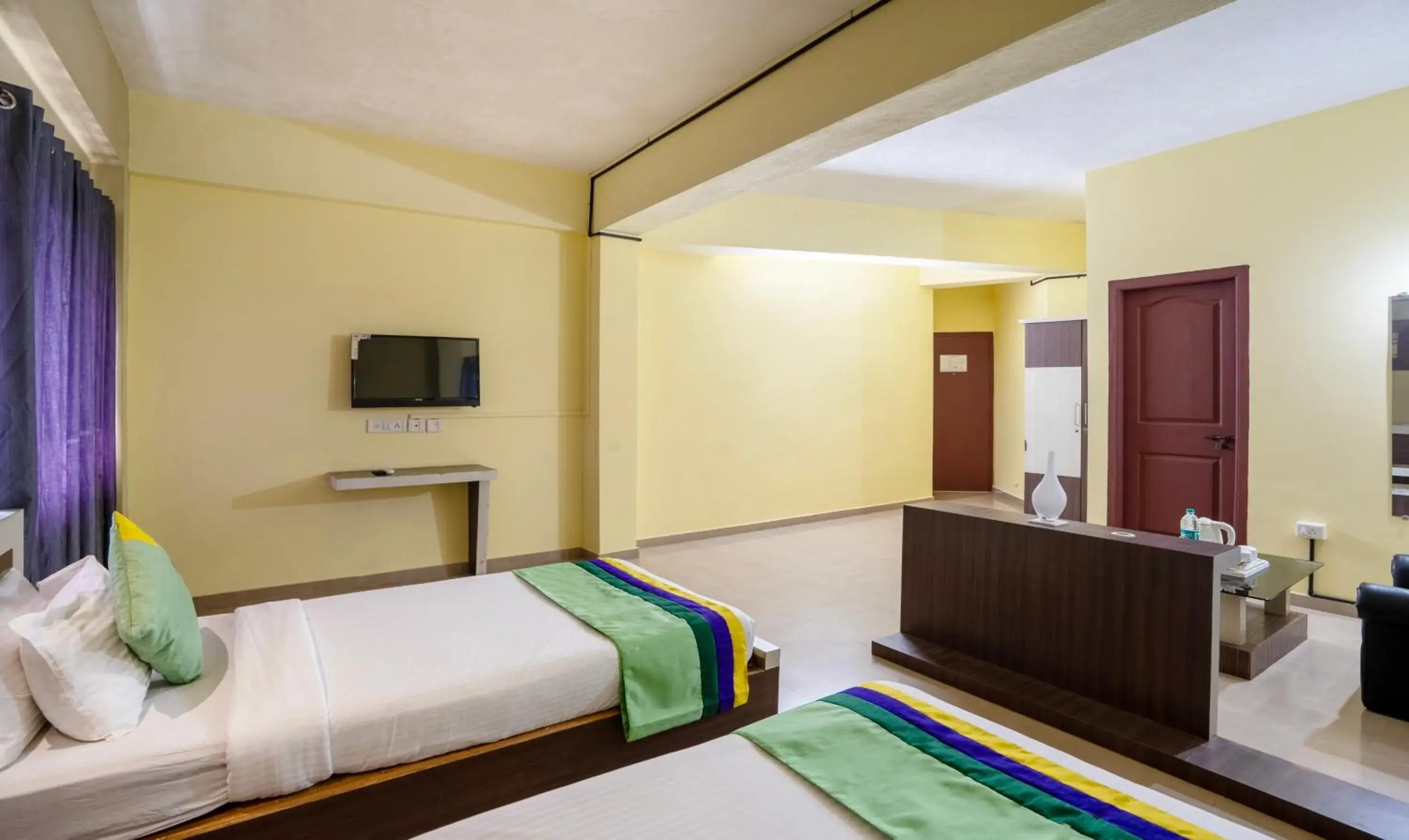 Bedroom, TV/Entertainment Center in Hotel Vijaya Residency