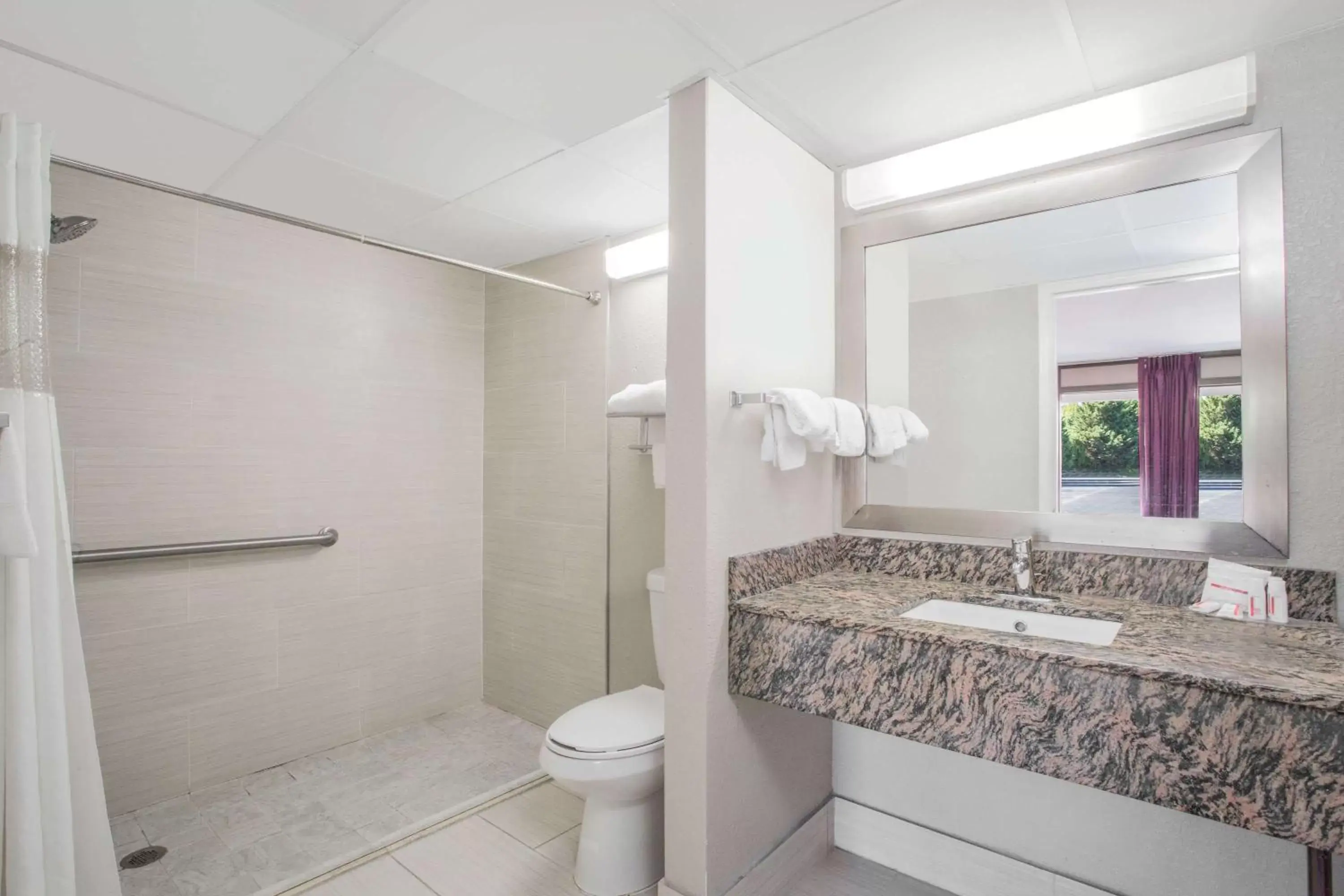 Bathroom in Ramada by Wyndham Edgewood Hotel & Conference Center