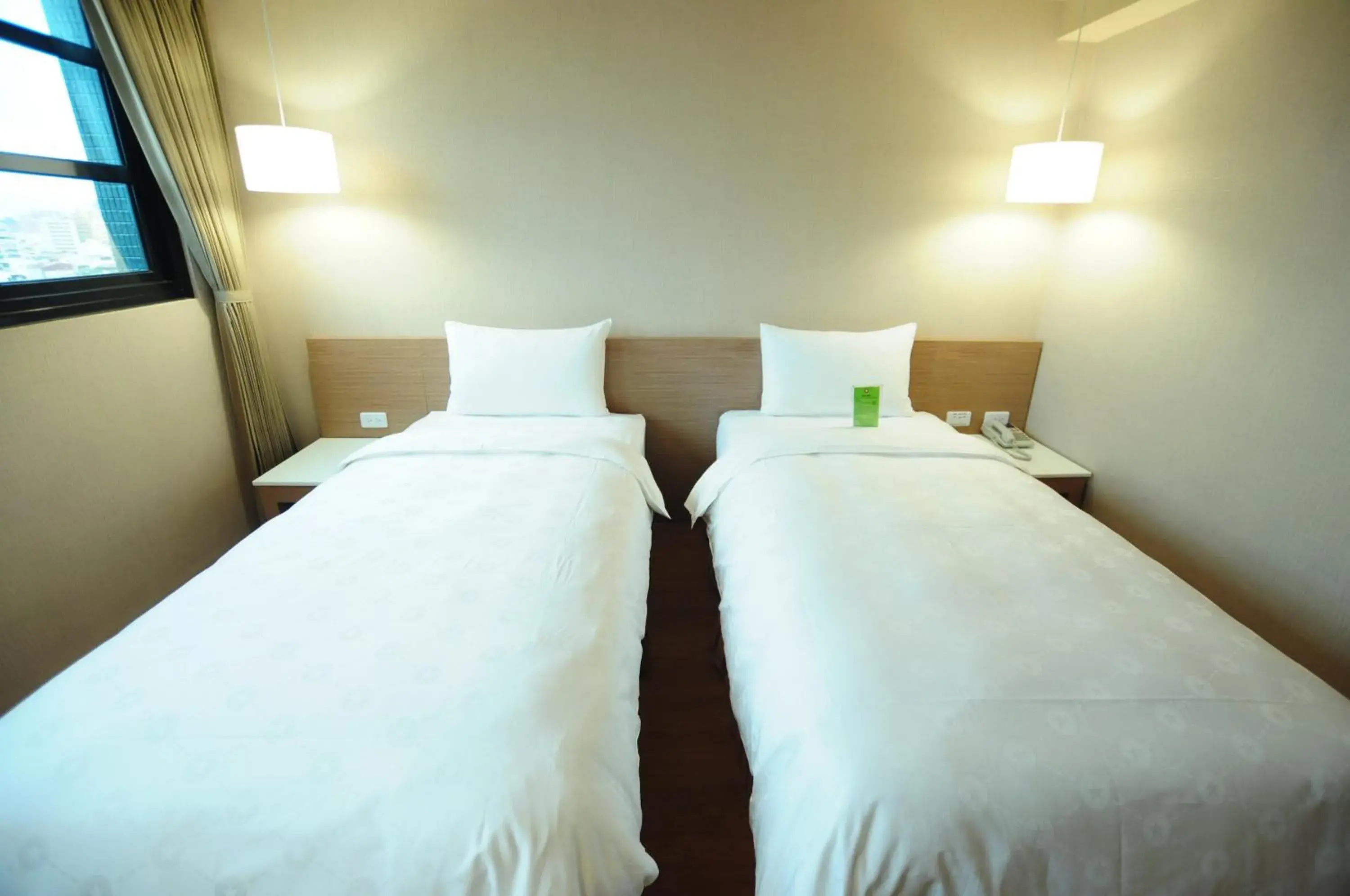 Bed in Kindness Hotel - Kaohsiung Main Station