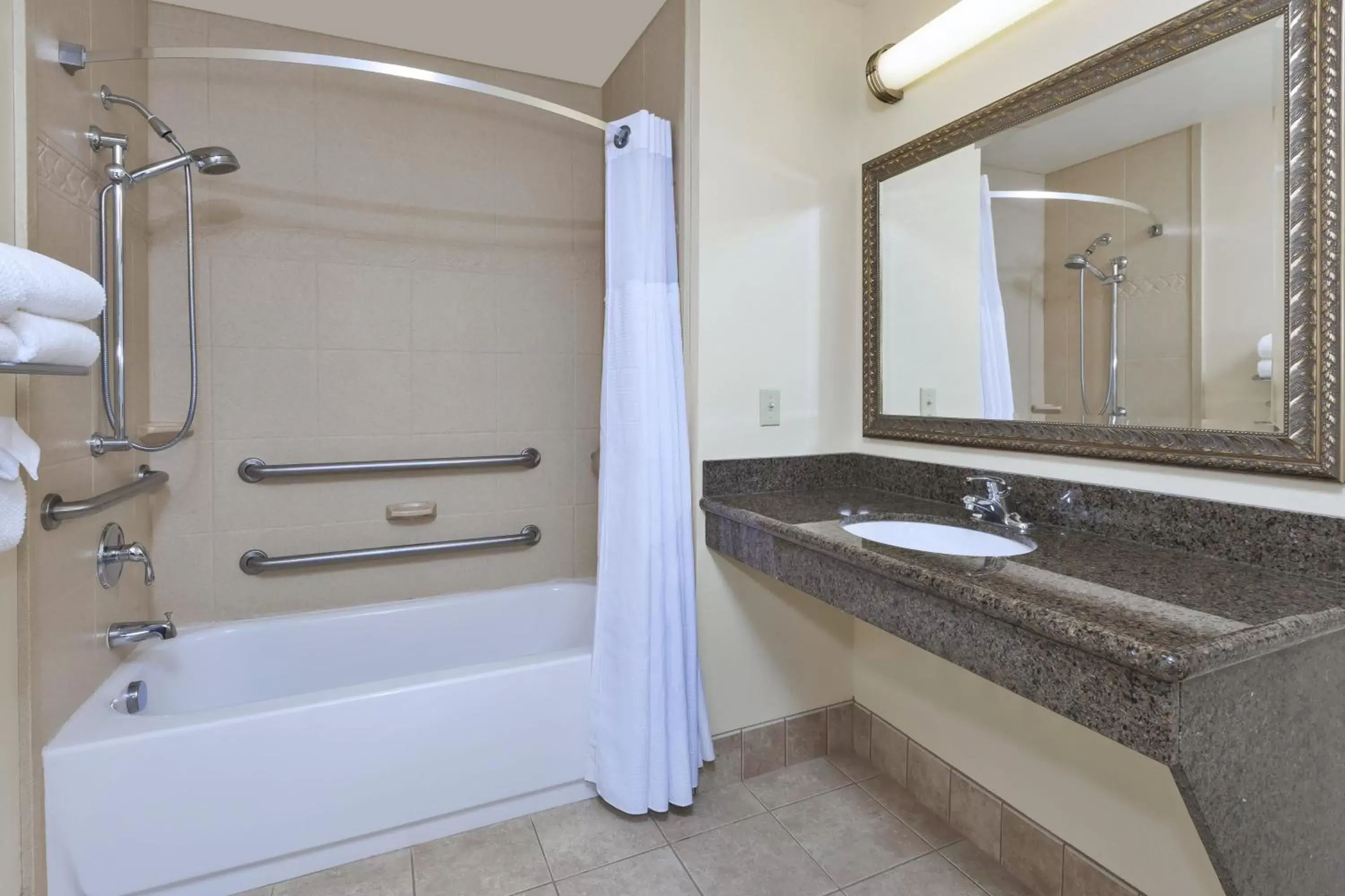 Bathroom in Staybridge Suites Lansing-Okemos by IHG Bathroom in Staybridge Suites Lansing-Okemos by IHG