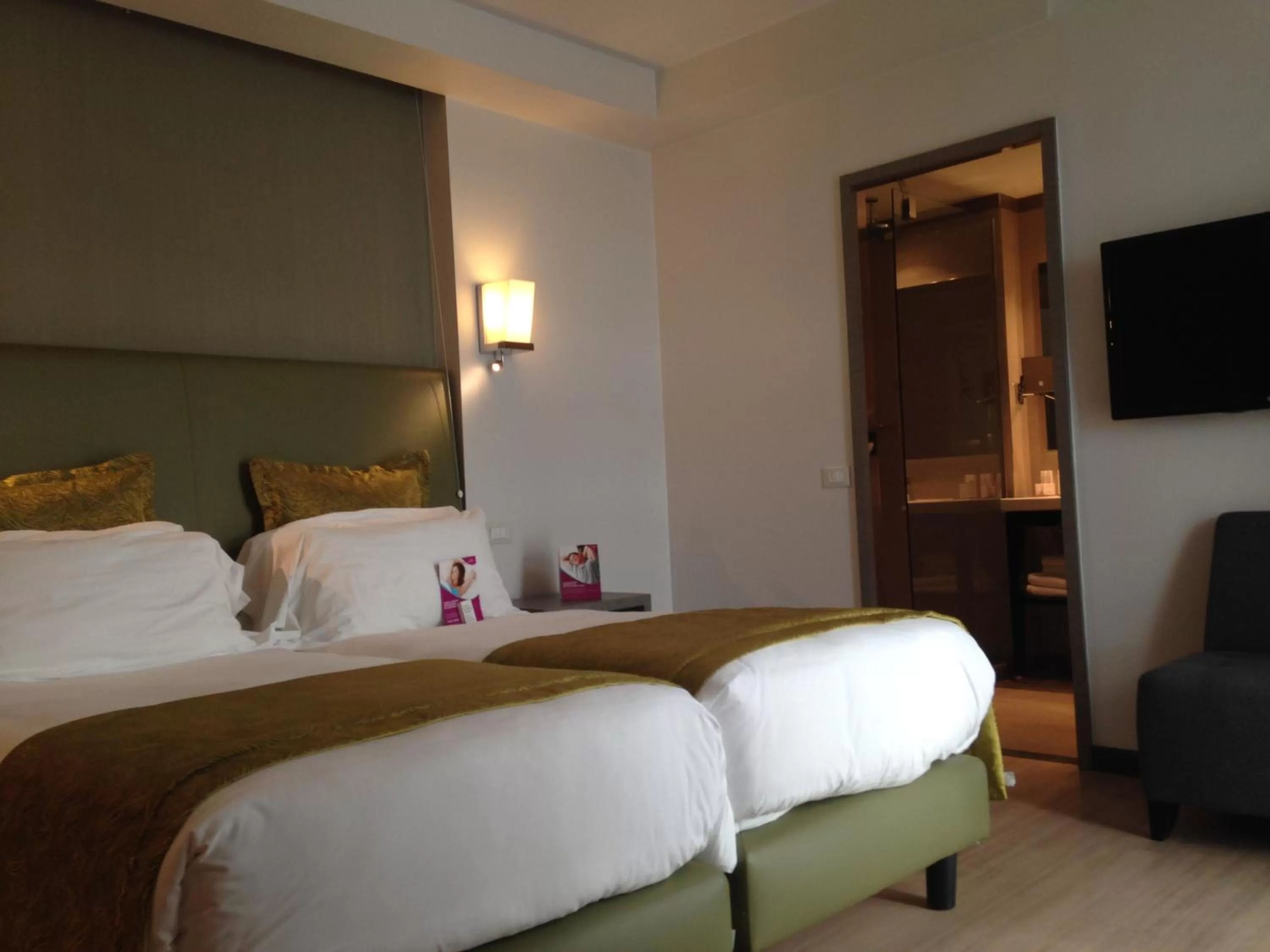 Facility for disabled guests, Bed in Crowne Plaza Verona Fiera by IHG