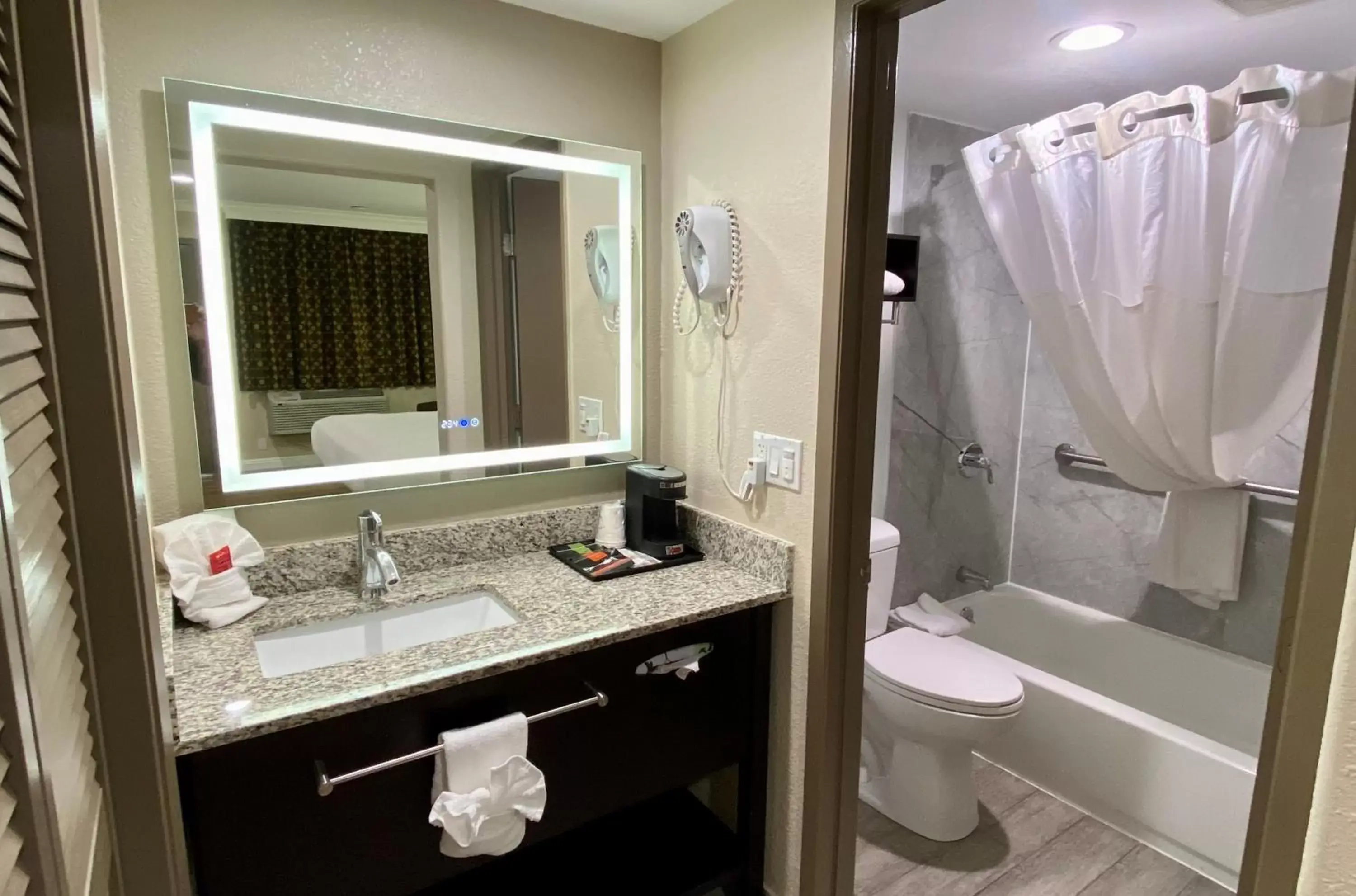 Bathroom in SureStay Hotel by Best Western Santa Cruz