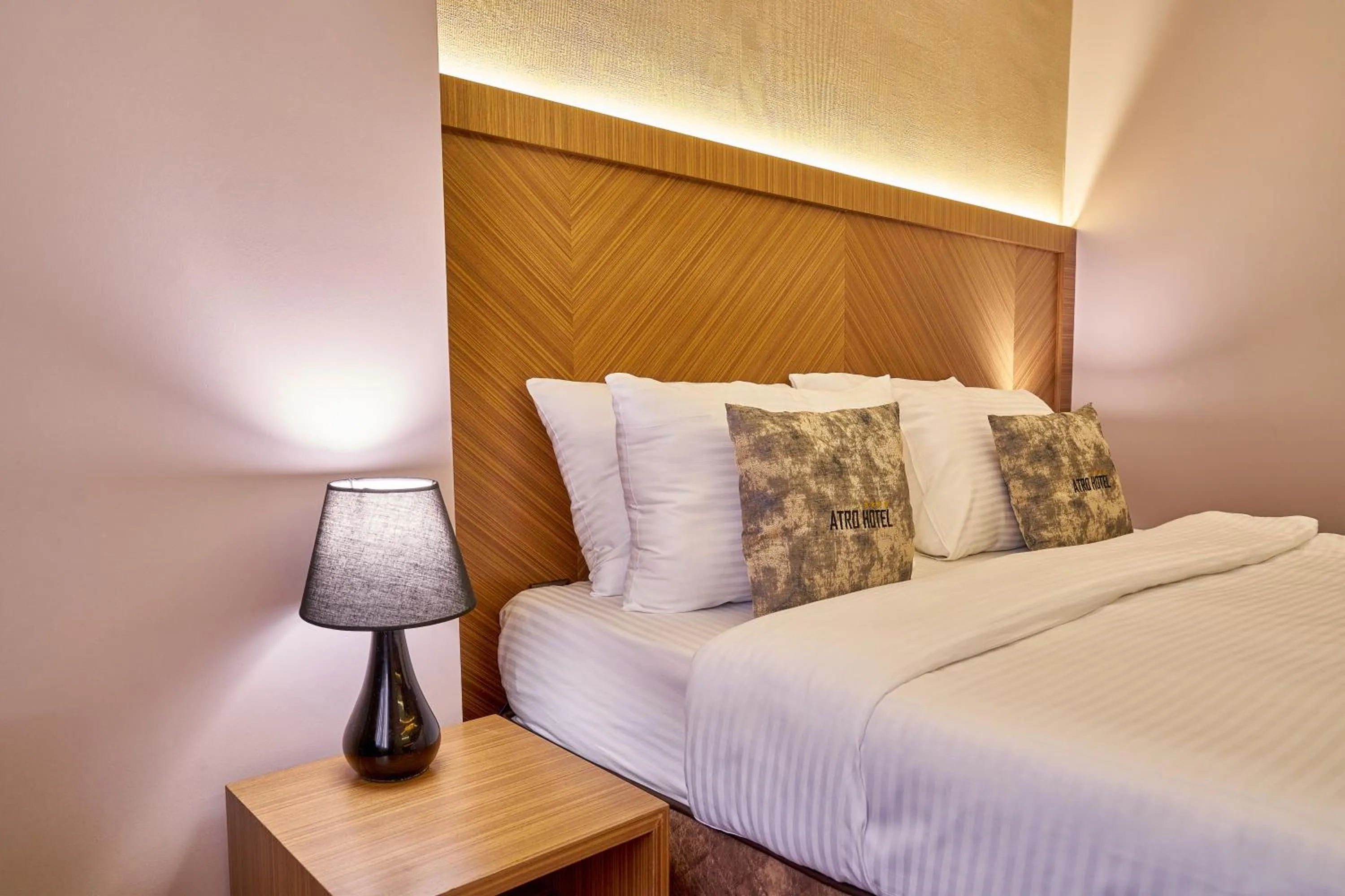 Bed in Atro Hotel
