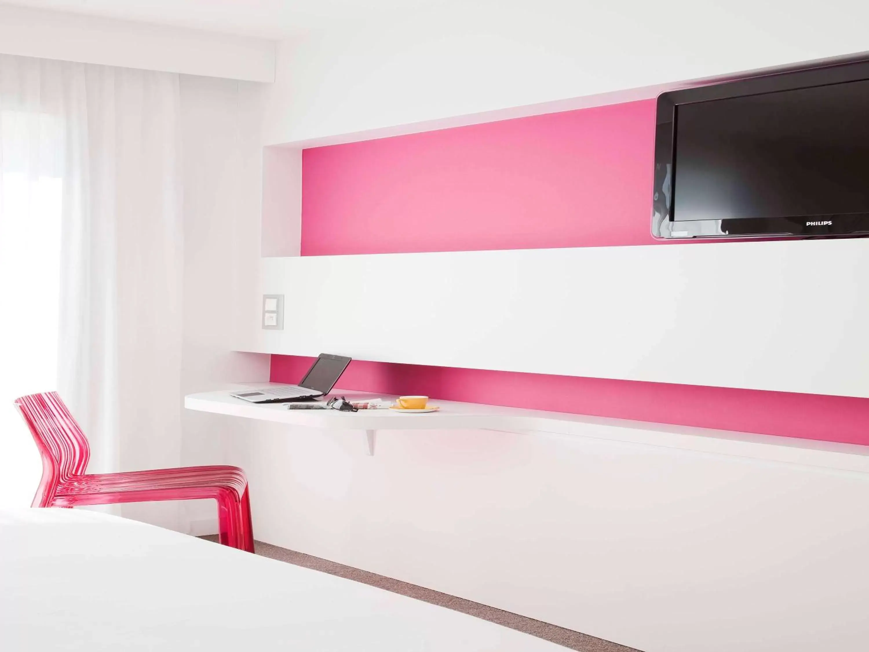 Photo of the whole room, TV/Entertainment Center in Ibis Styles Menton Centre