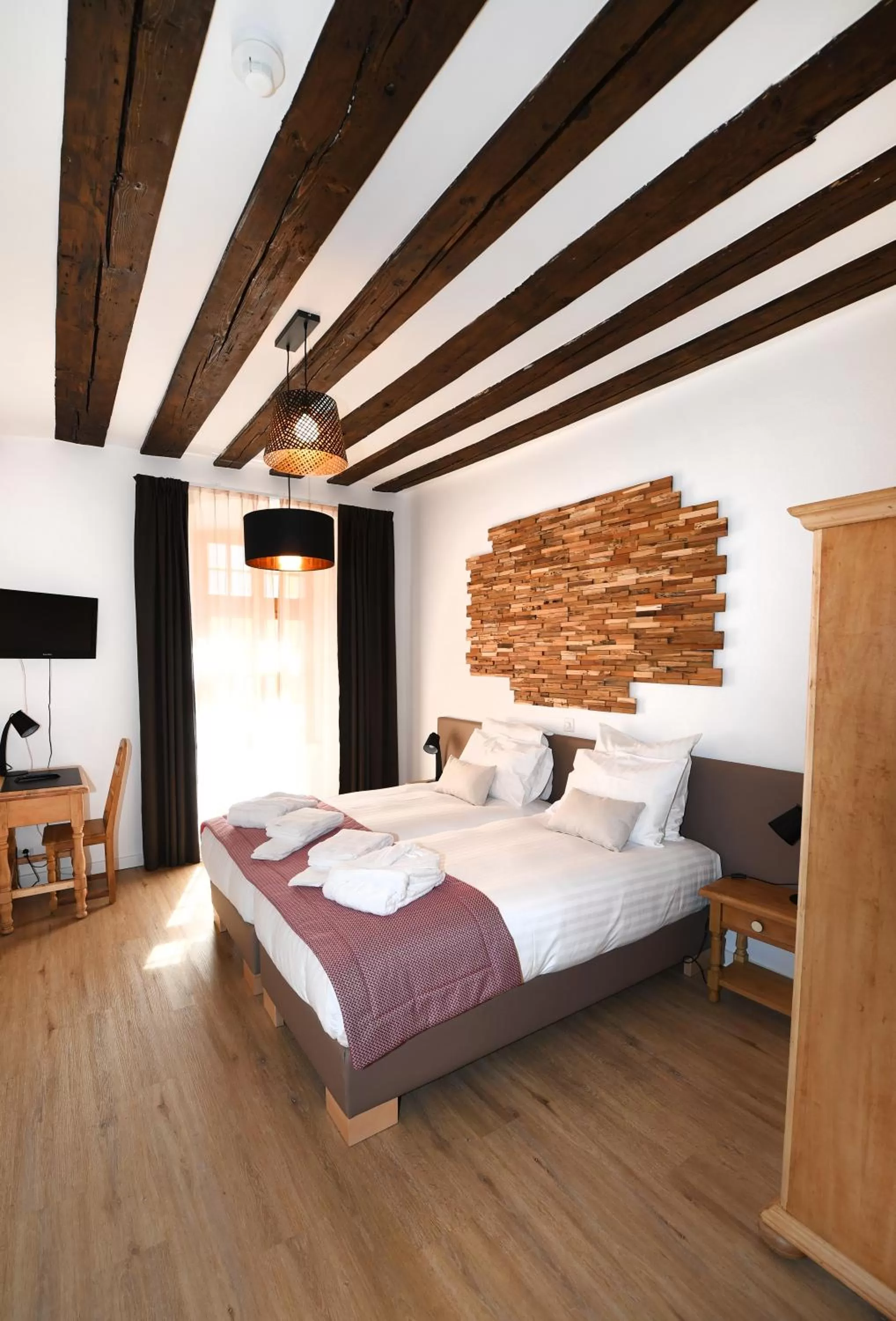 Bed in Hôtel de Ville d'Ollon