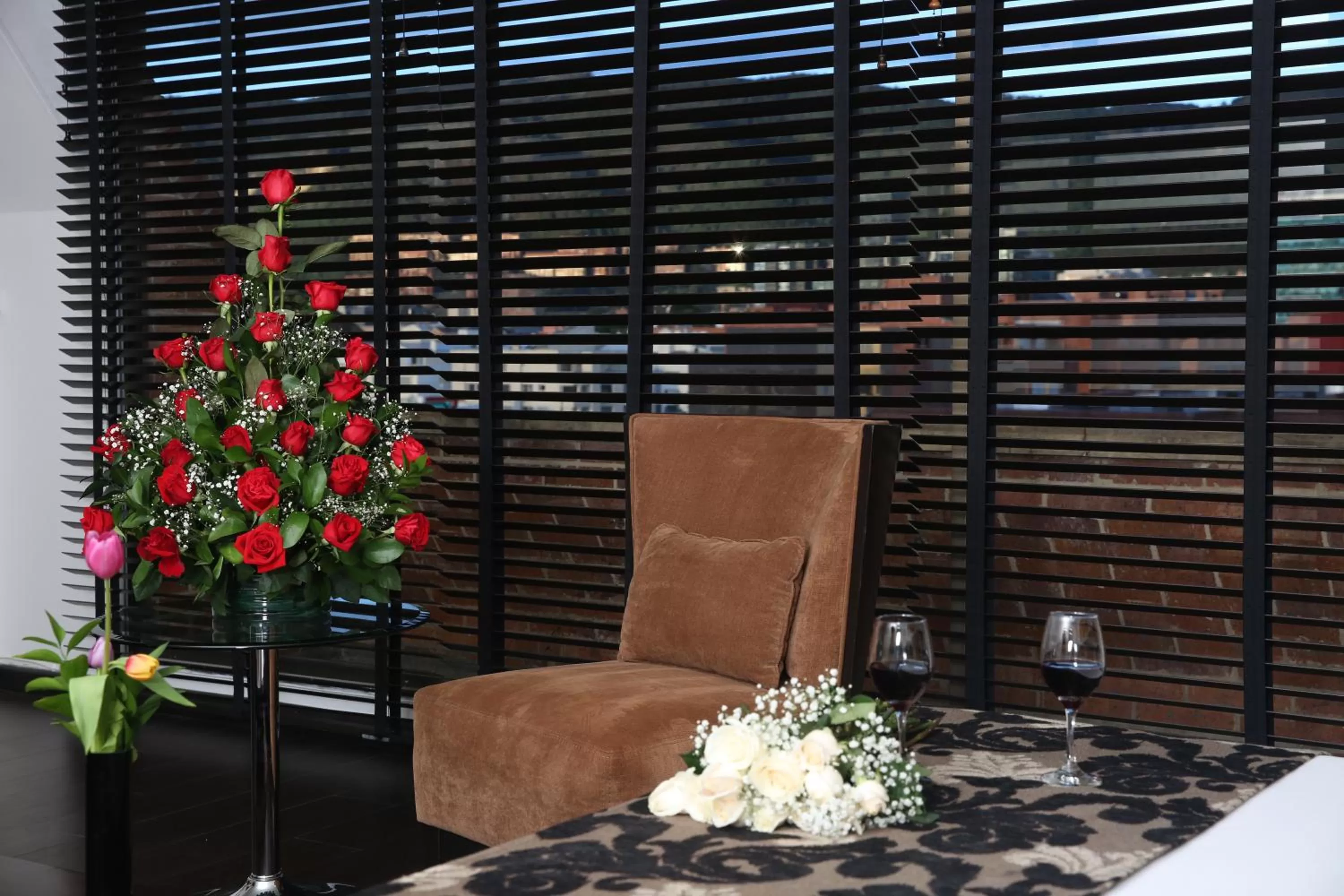 Bed in Hotel Suites 108