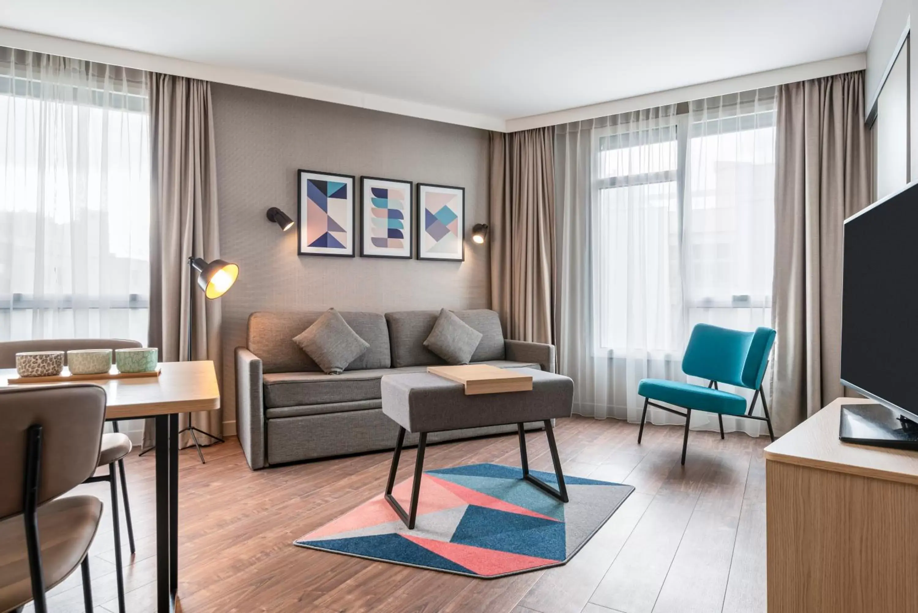 Living room, Seating Area in Aparthotel Adagio Paris Nation