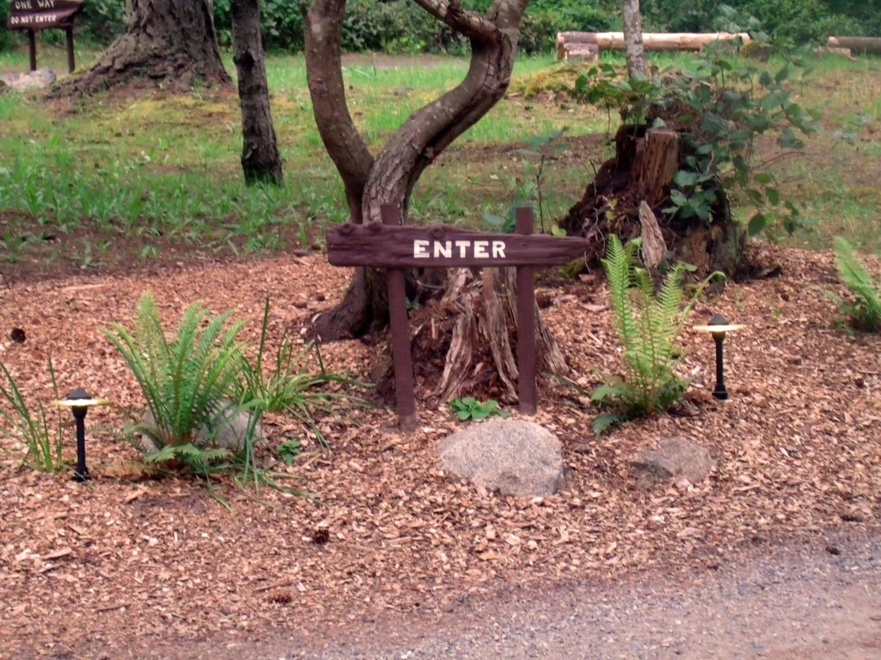 Property logo or sign in Inn to the Woods