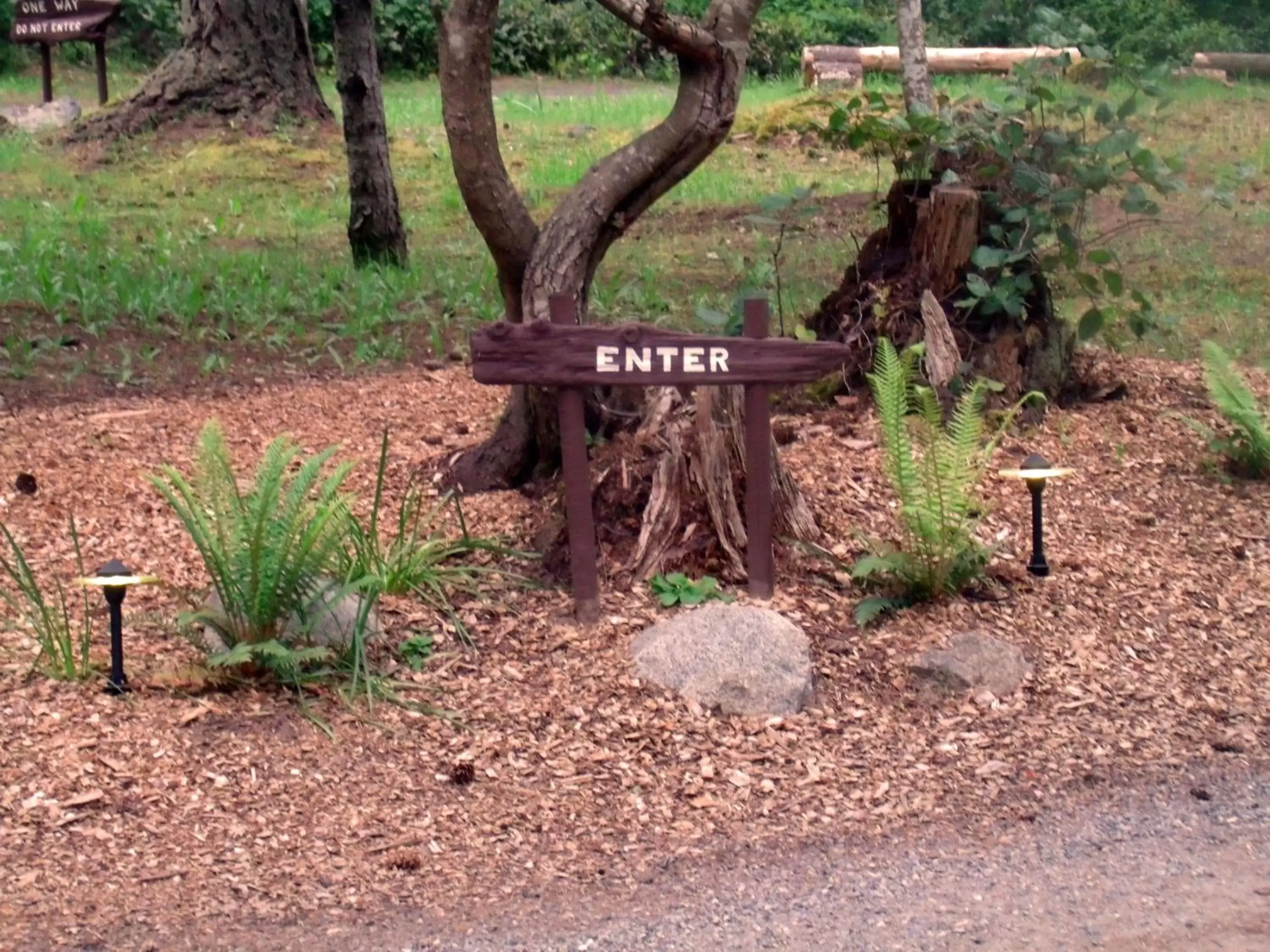 Property logo or sign in Inn to the Woods