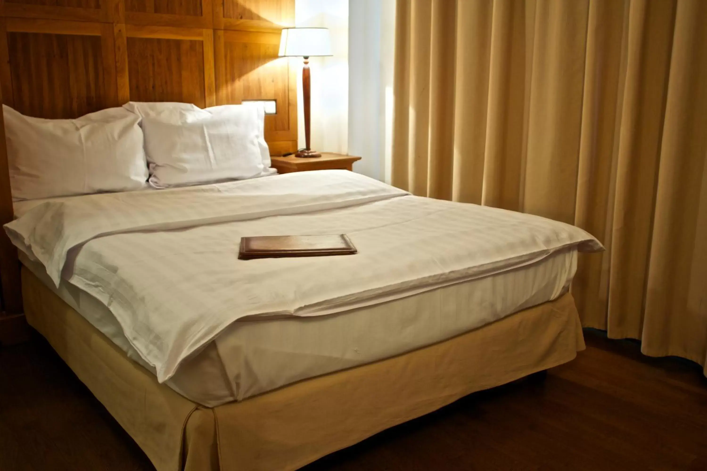 Bed in Rembrandt Hotel