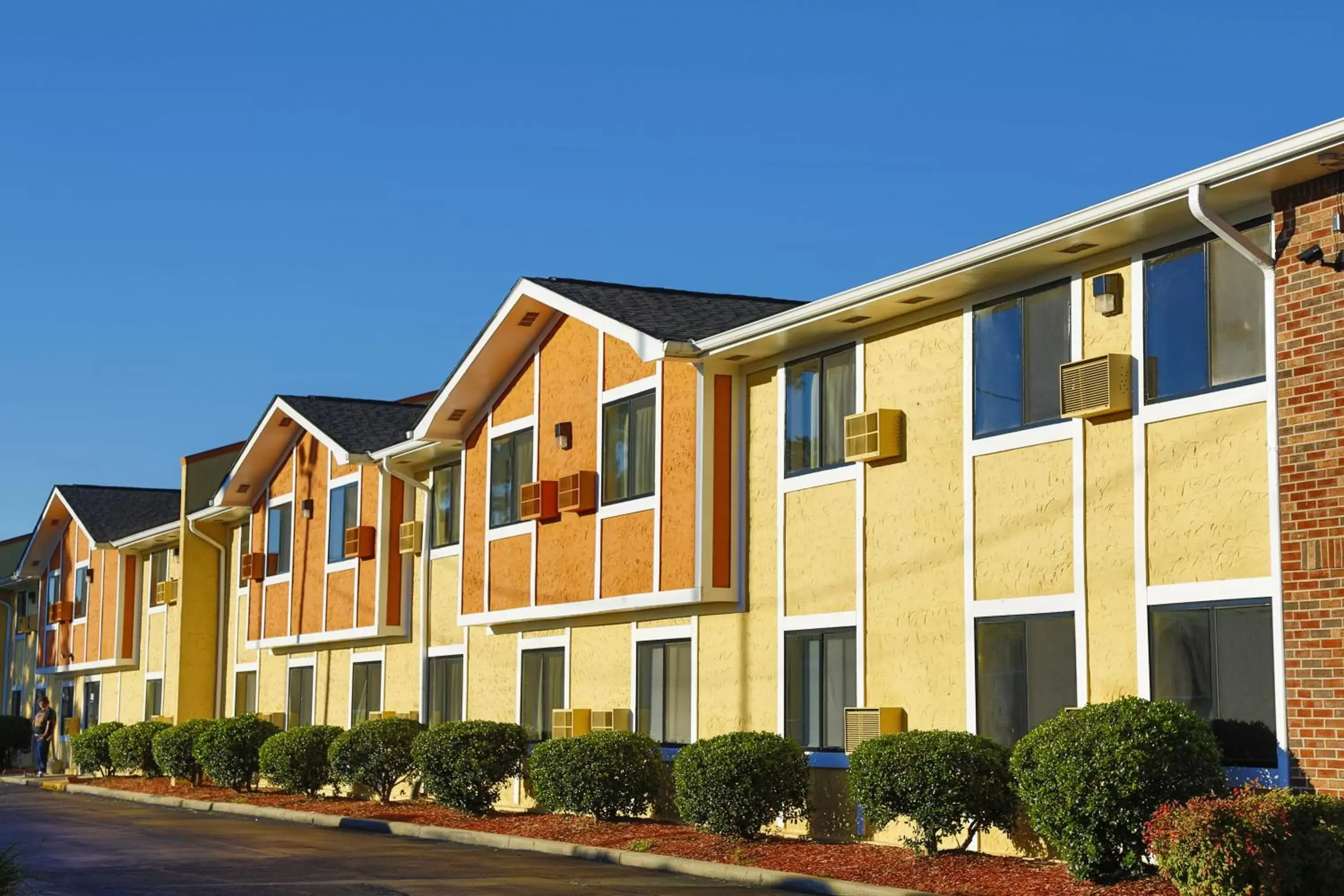 Swimming pool, Property Building in Super 8 by Wyndham Charlotte University