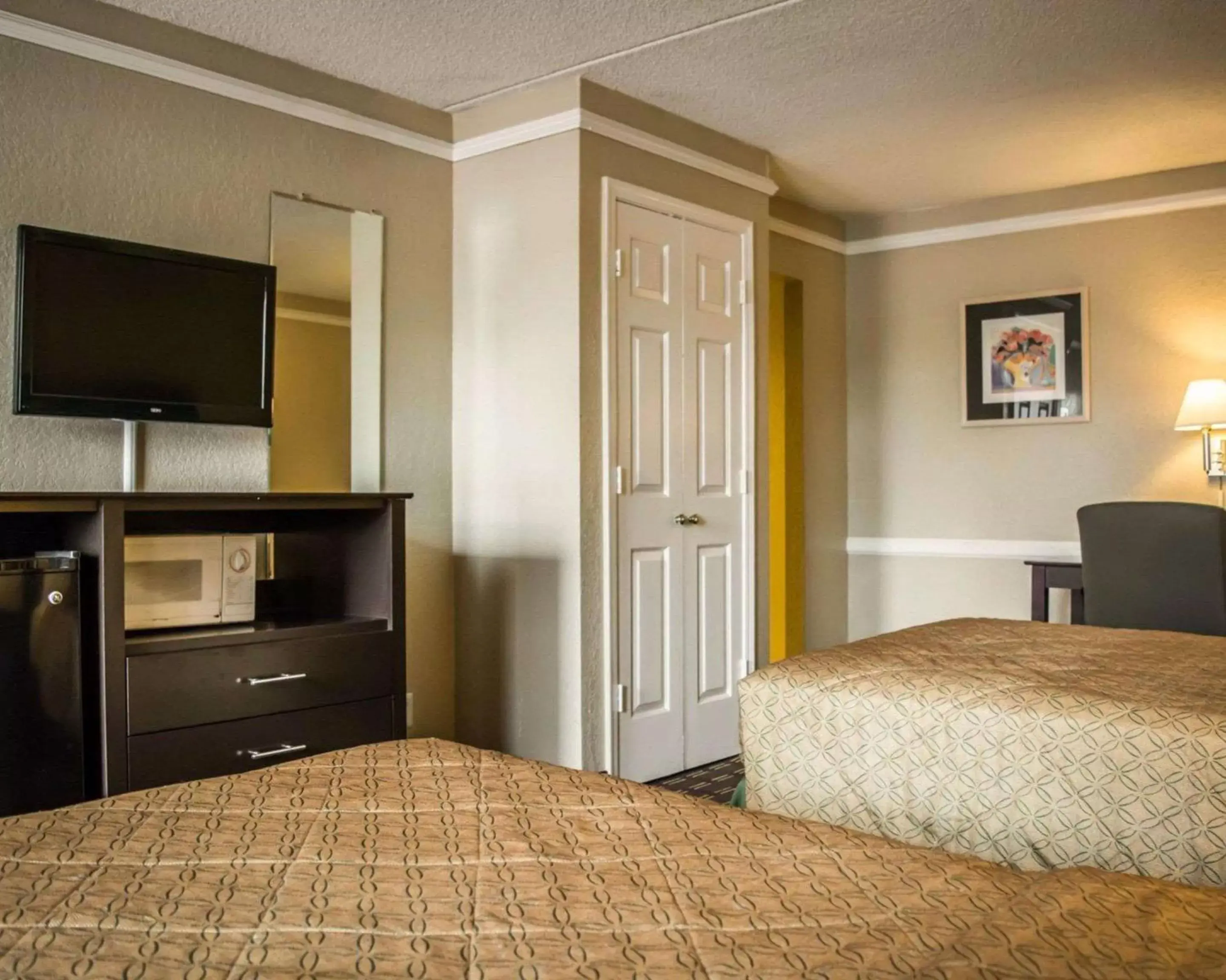 Photo of the whole room, Bed in Rodeway Inn Near Ybor City - Casino