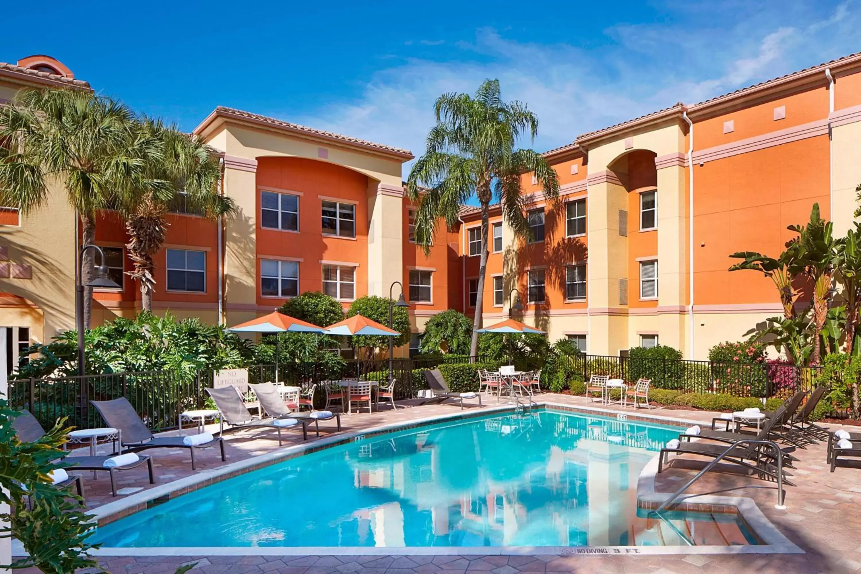 Swimming pool, Property Building in Residence Inn by Marriott Naples