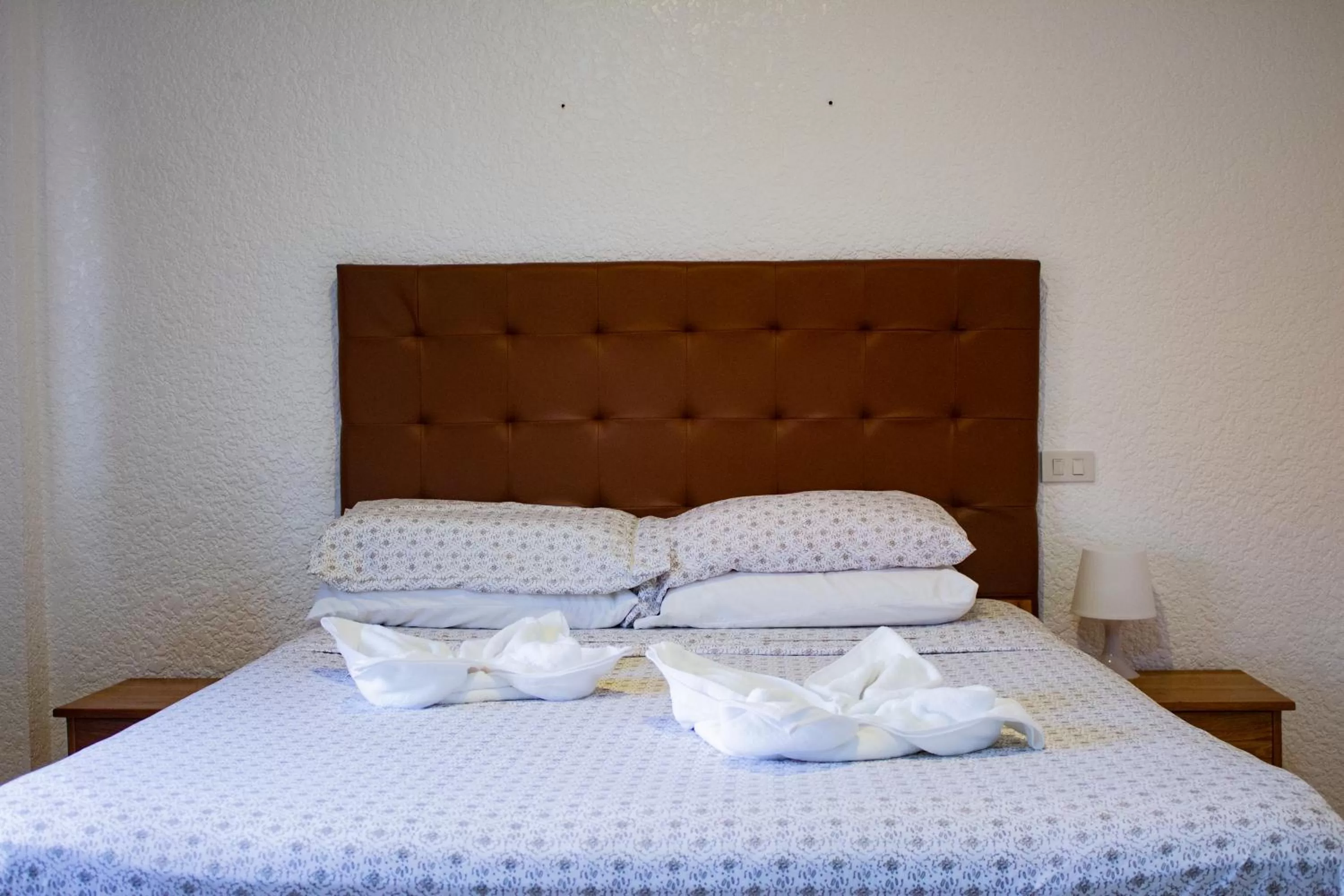 Bed in Jugalis Hotel and Restaurant