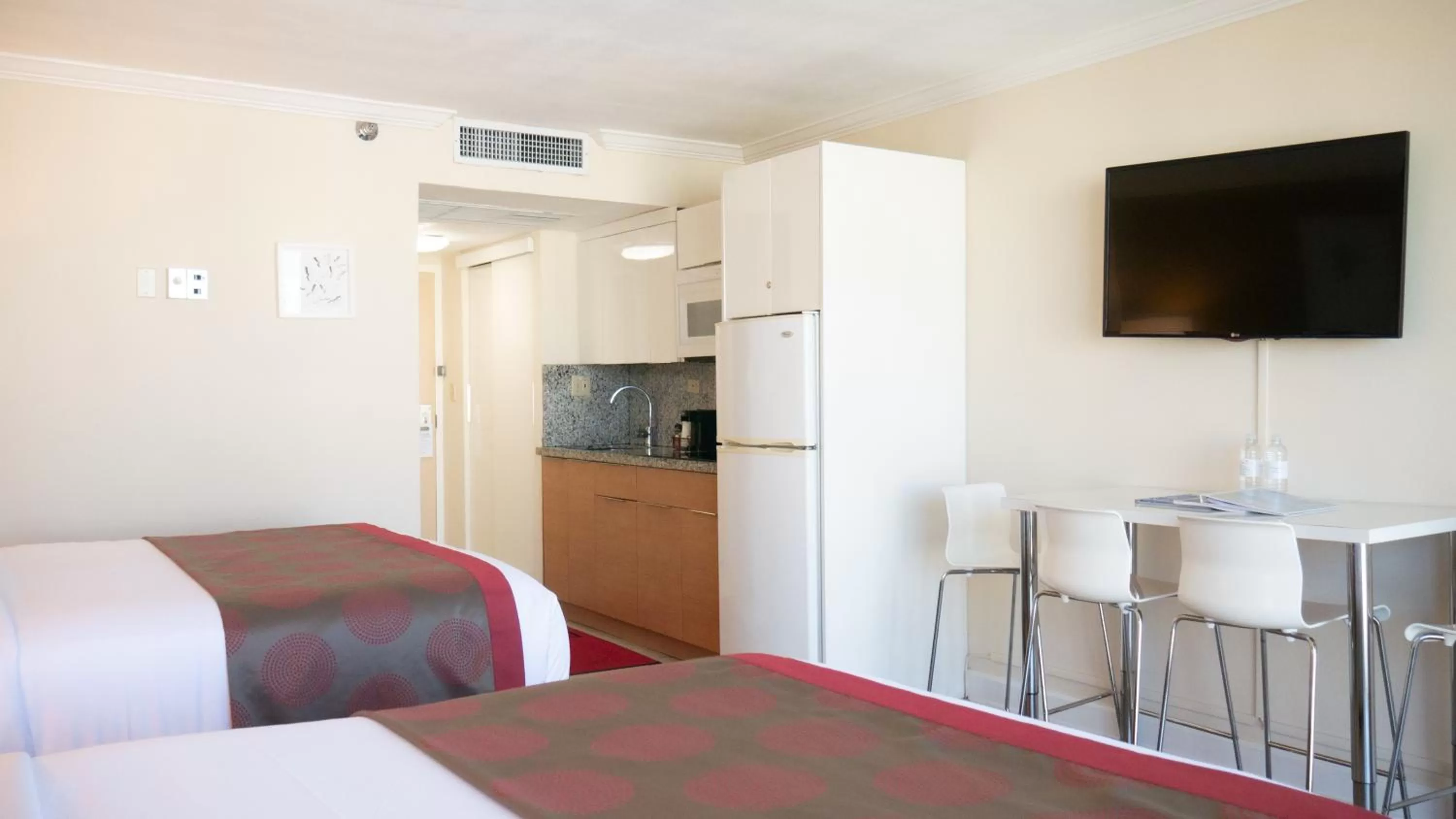 Bed in Ramada Plaza by Wyndham Marco Polo Beach Resort