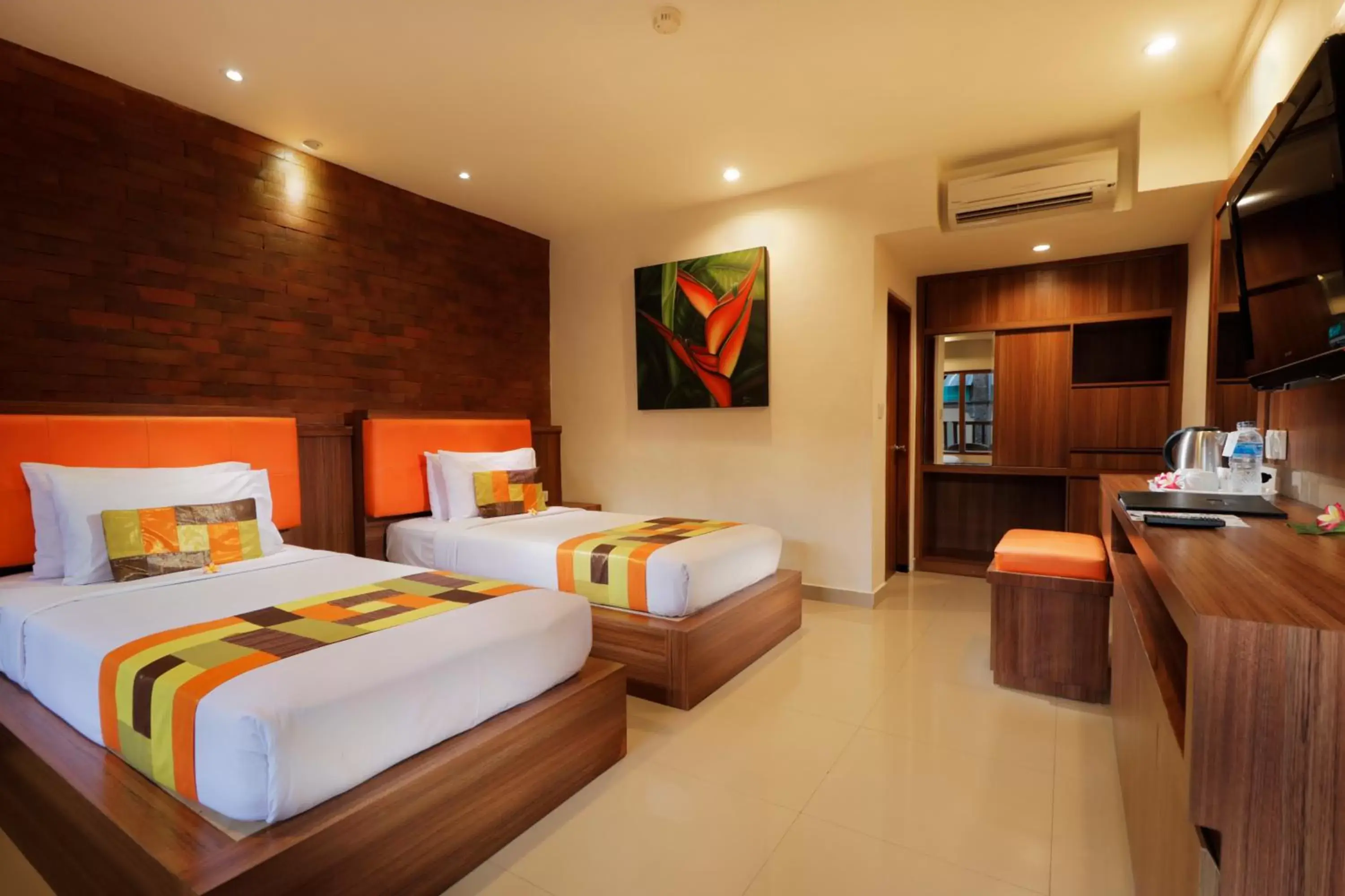 Bed in Wina Holiday Villa Kuta Bali