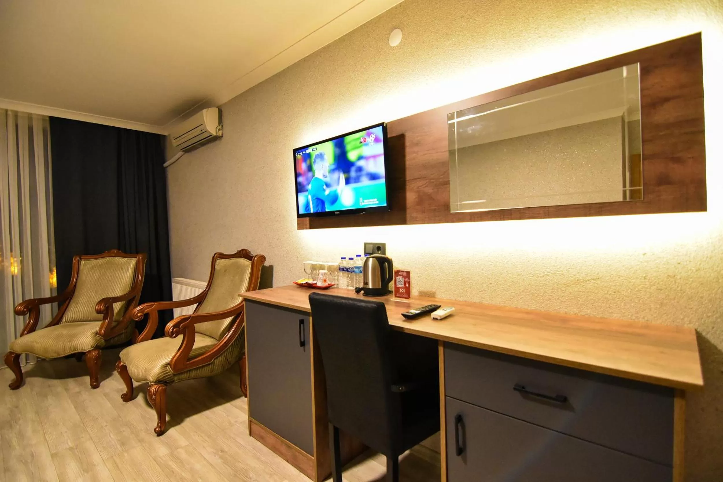 Communal lounge/ TV room, TV/Entertainment Center in Sandal Otel