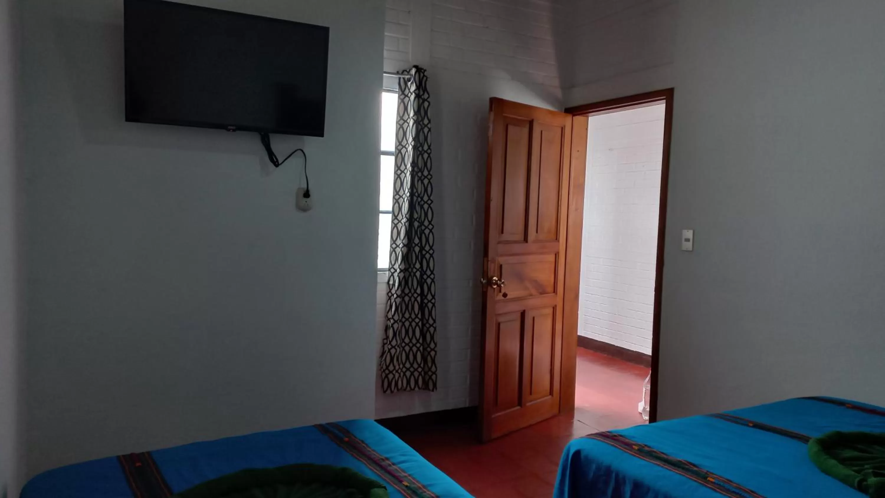 TV and multimedia, TV/Entertainment Center in Hospedaje el Viajero Antigua ll