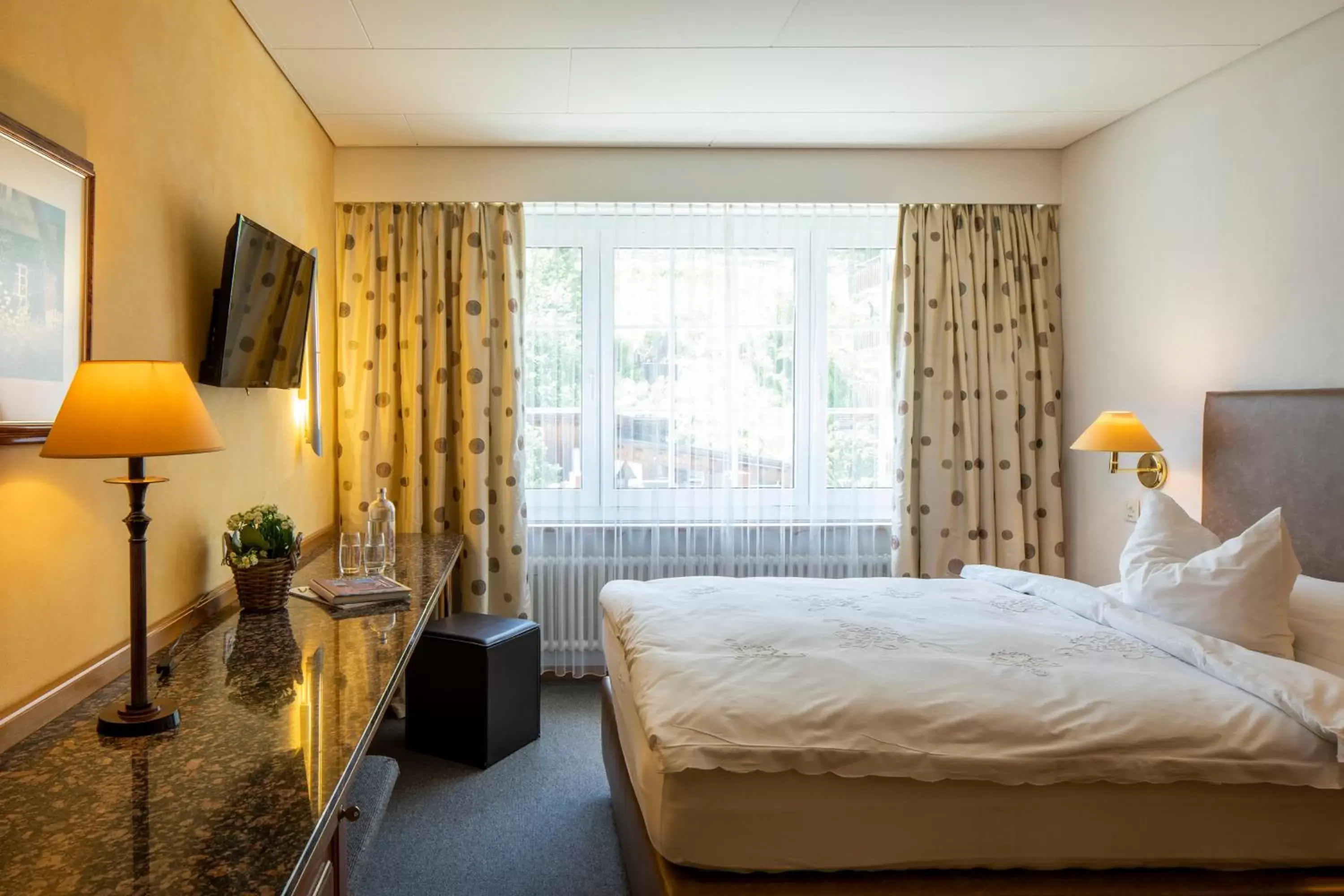 Bed in Cristallo Arosa Hotel