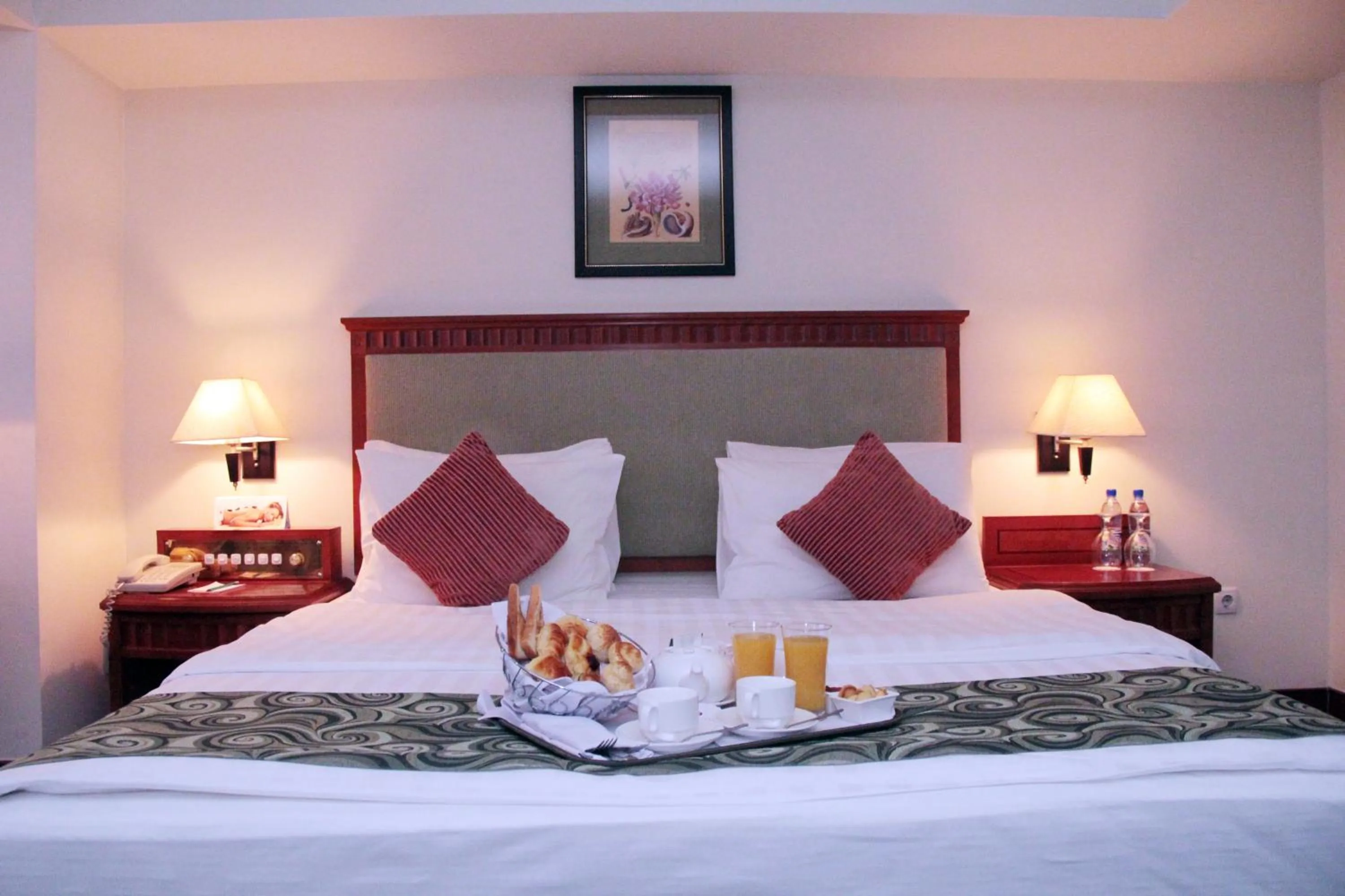 Bed in Ramada by Wyndham Tashkent