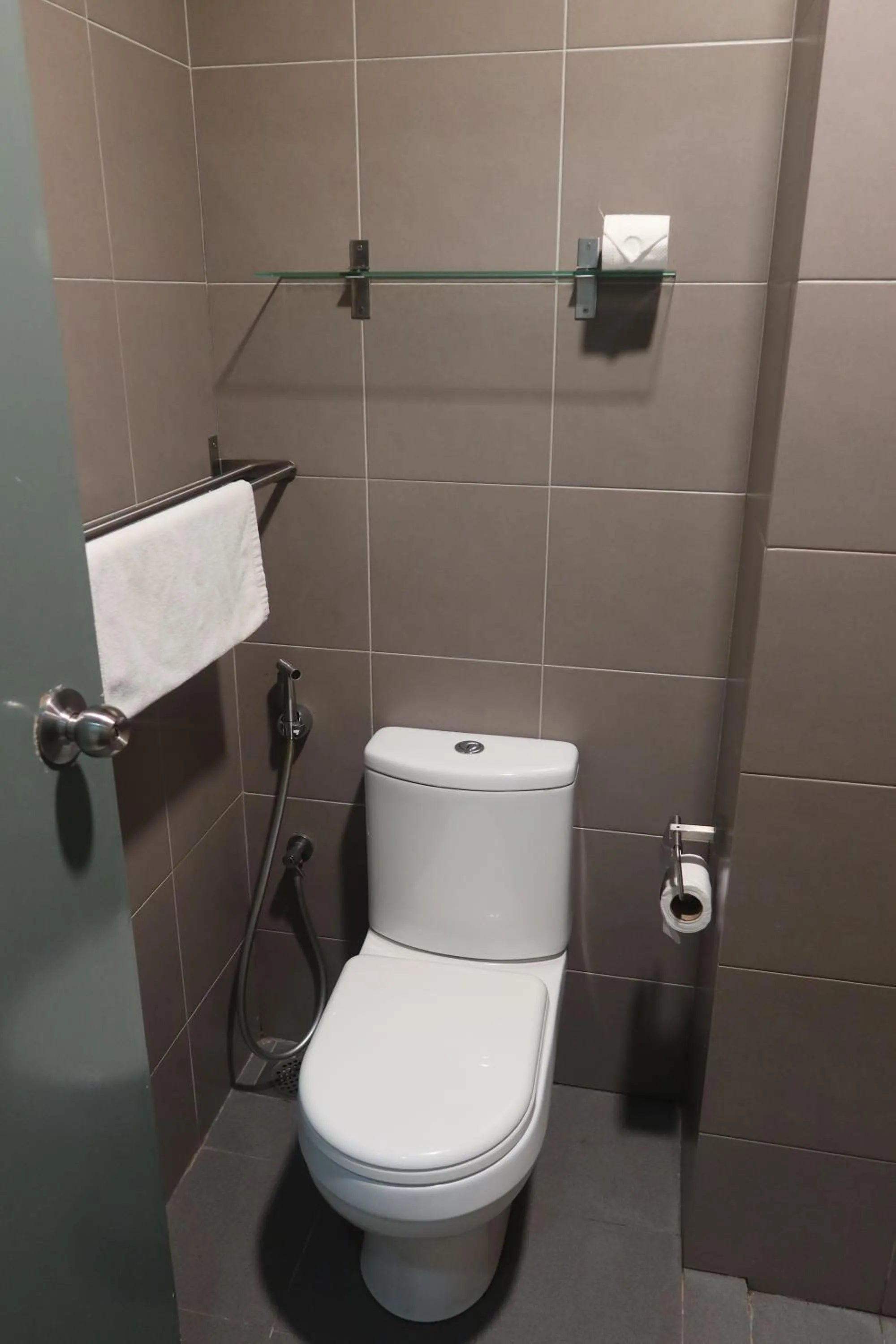 Toilet in Summer Suites Residences by Subhome