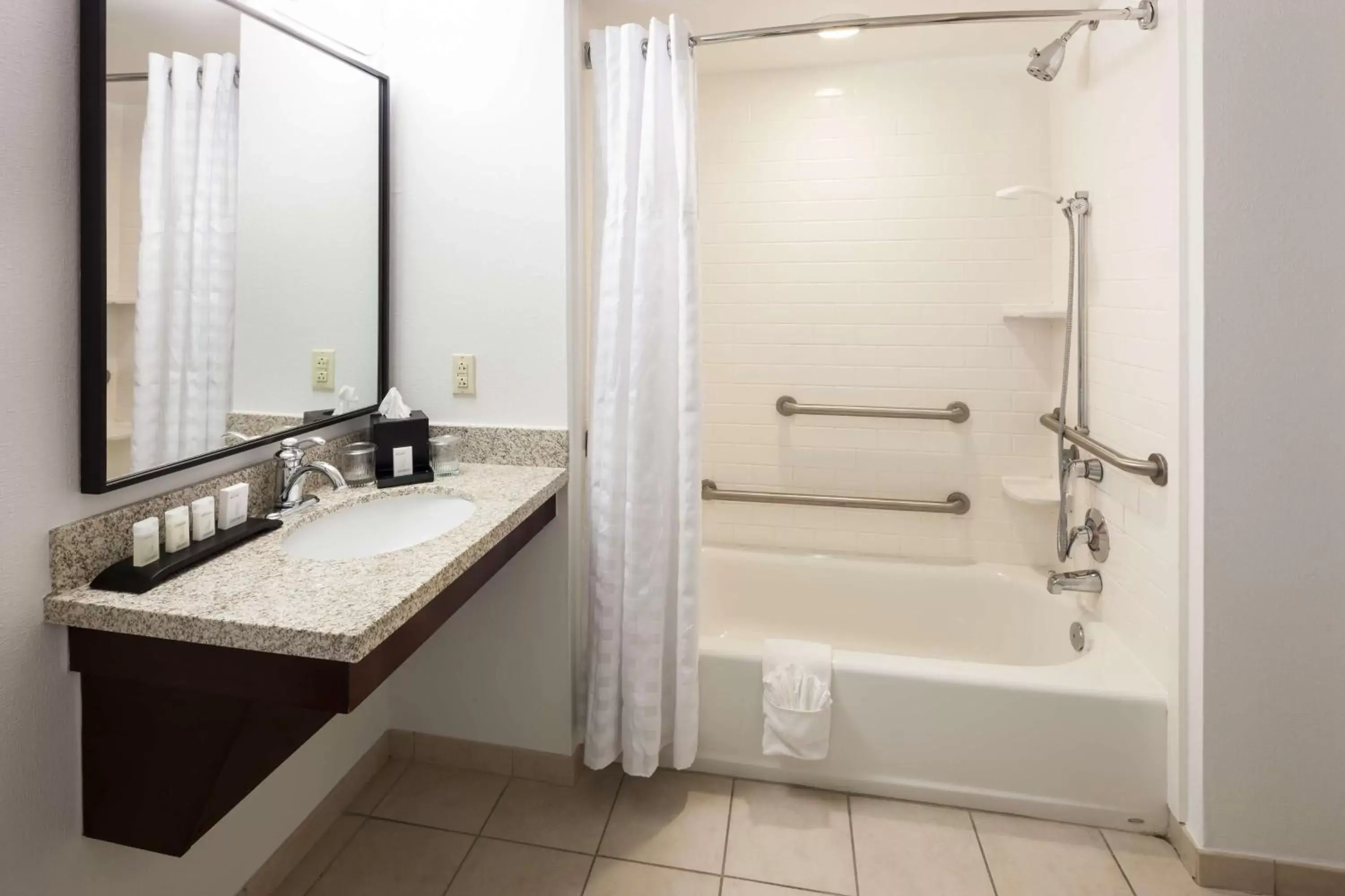 Bathroom in Embassy Suites by Hilton Tampa Brandon