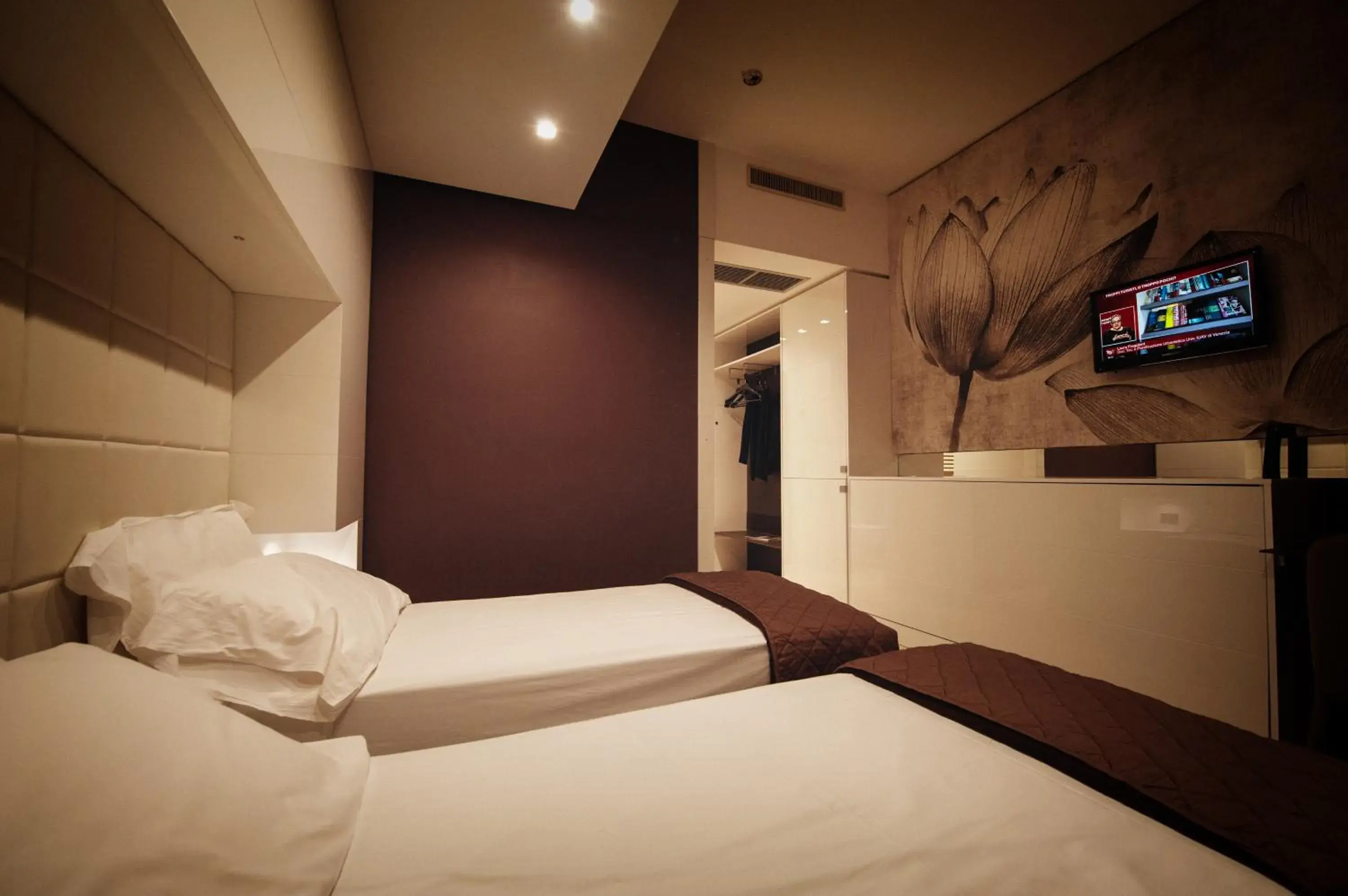 Bed in Gran Paradiso Hotel Spa
