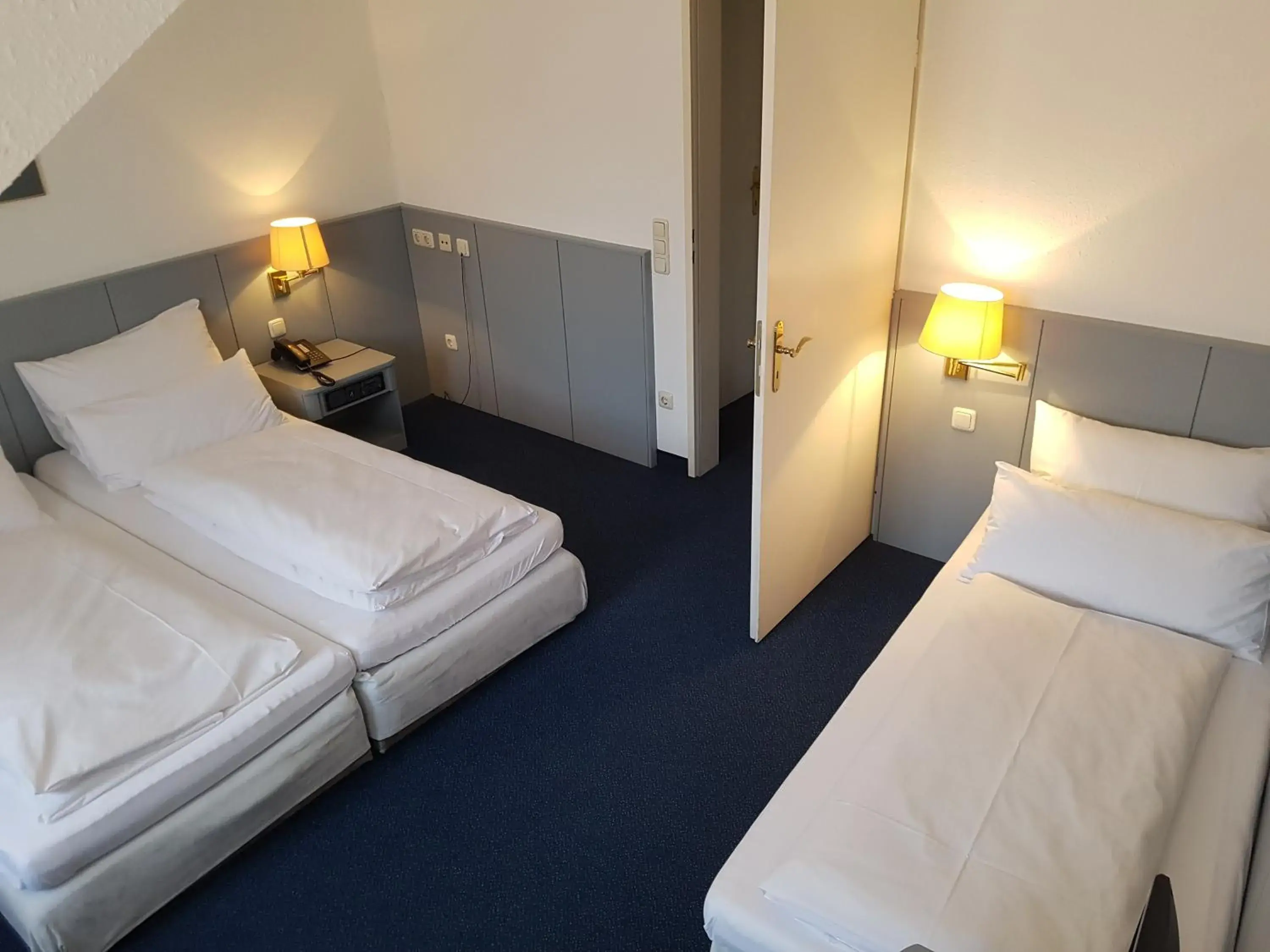 Photo of the whole room, Bed in Altstadthotel Augsburg