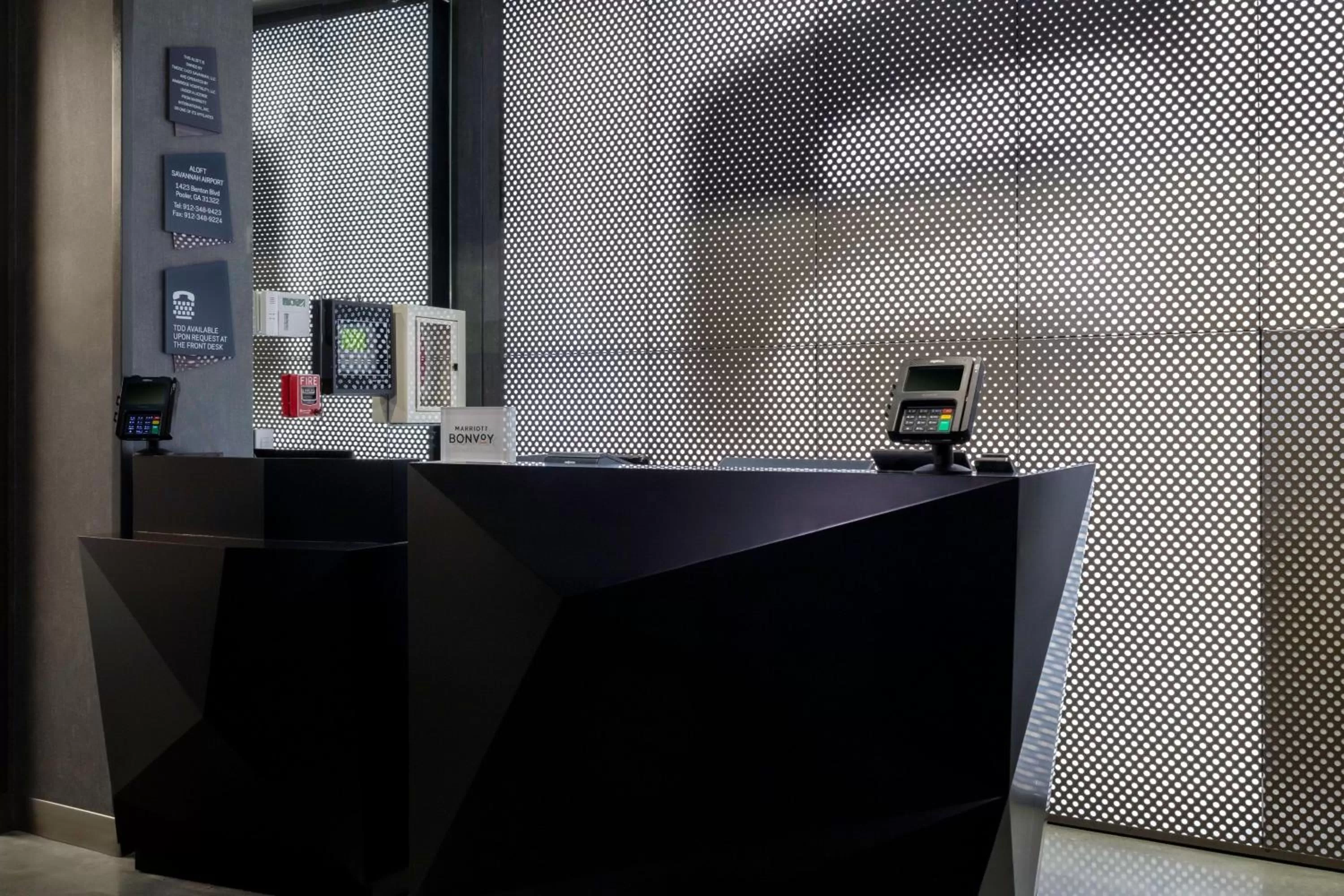 Lobby or reception in Aloft Savannah Airport