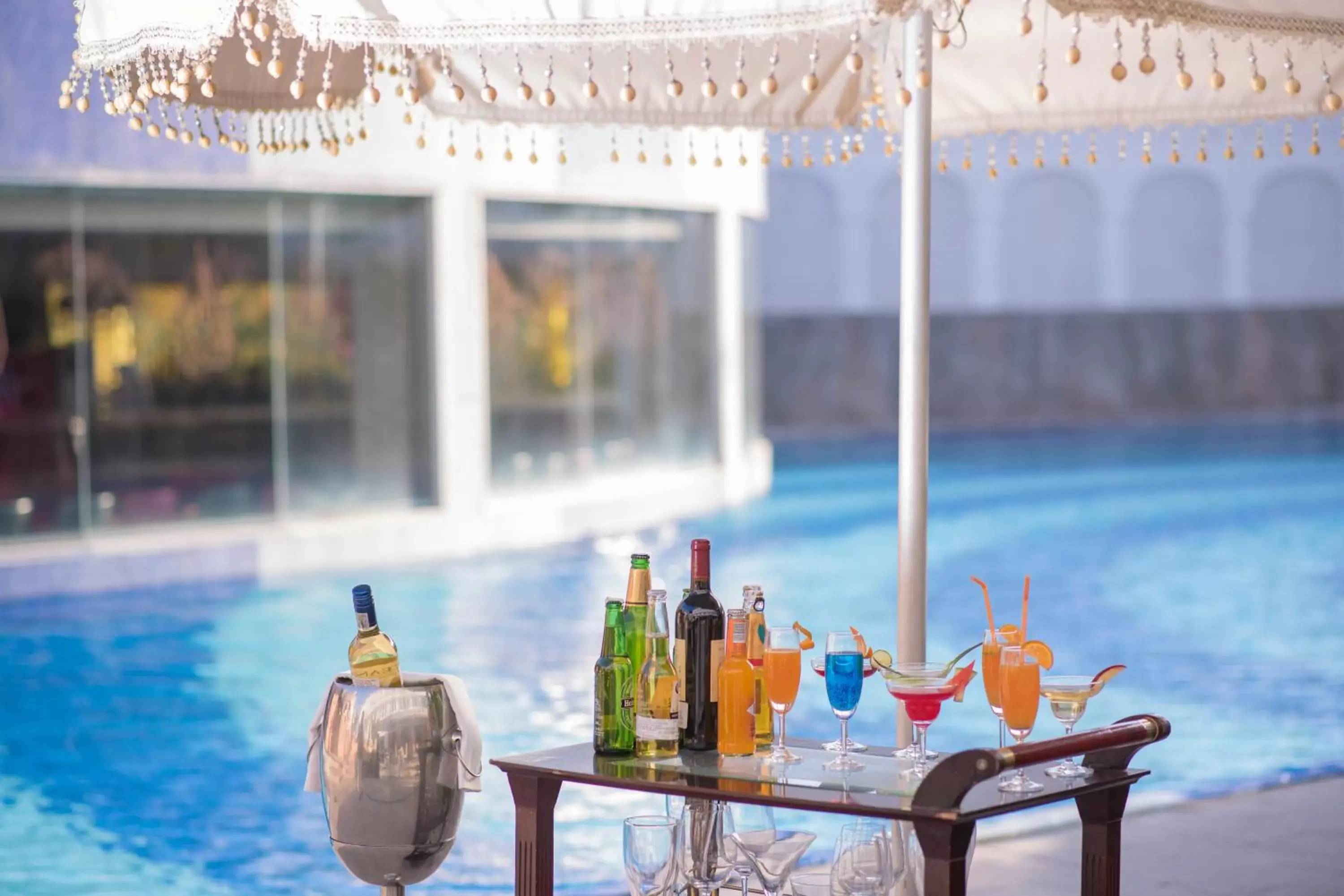Food and drinks, Swimming Pool in Radisson Blu Udaipur Palace Resort & Spa