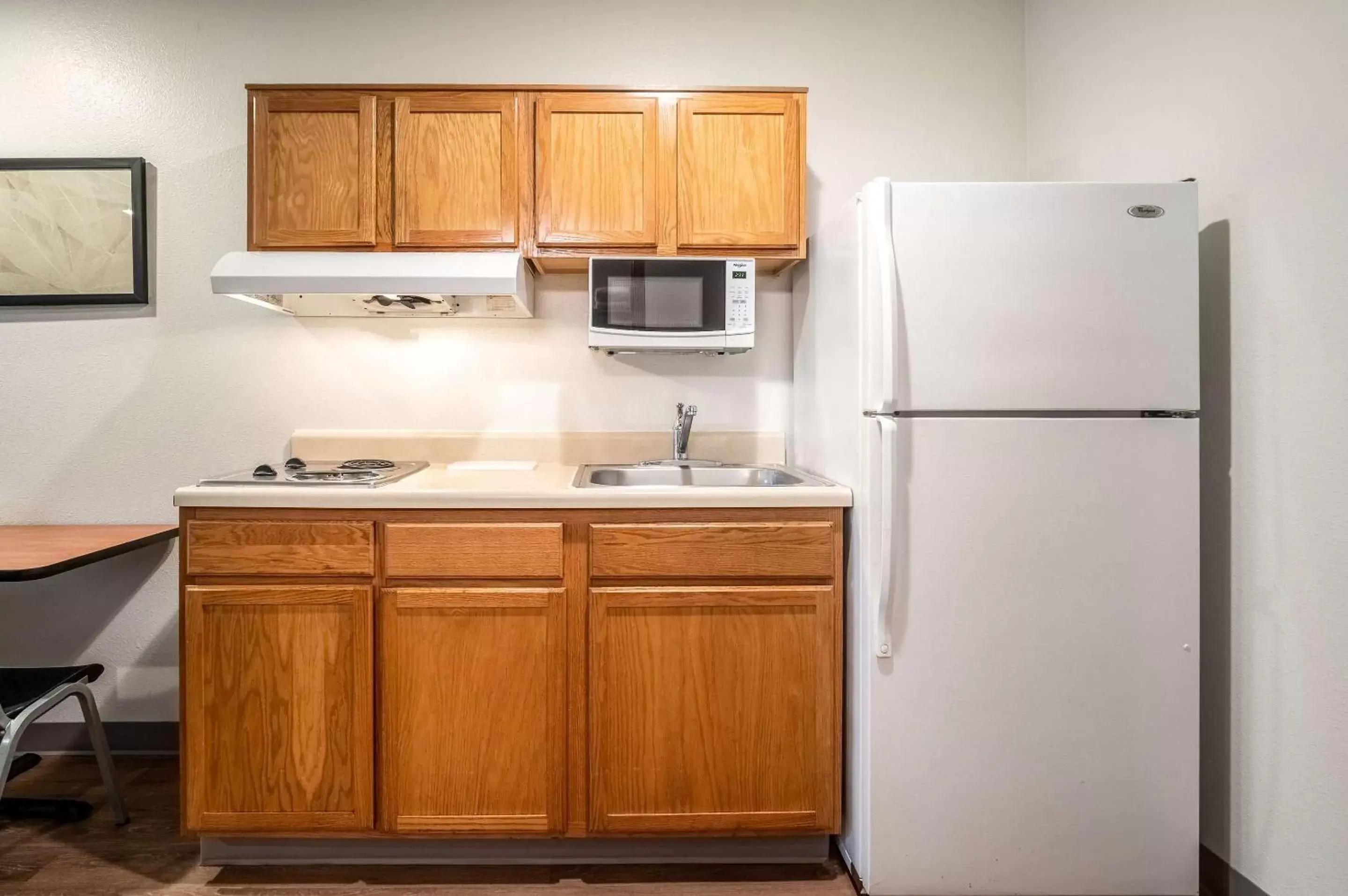 Photo of the whole room, Kitchen/Kitchenette in WoodSpring Suites Corpus Christi