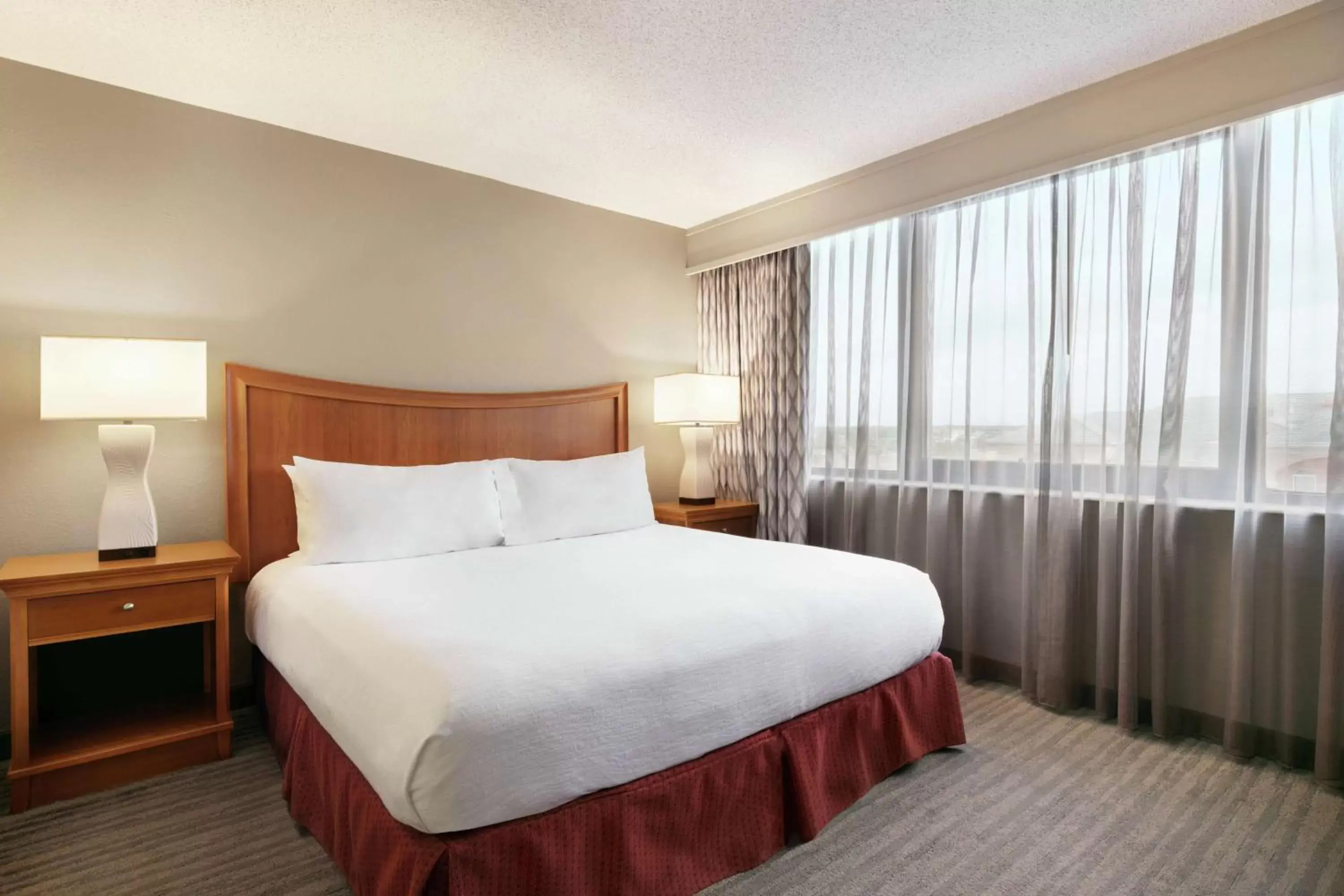 One Bedroom Suite with 1 King Bed - Hearing Accessible/Non-Smoking in Embassy Suites by Hilton Orlando International Drive ICON Park