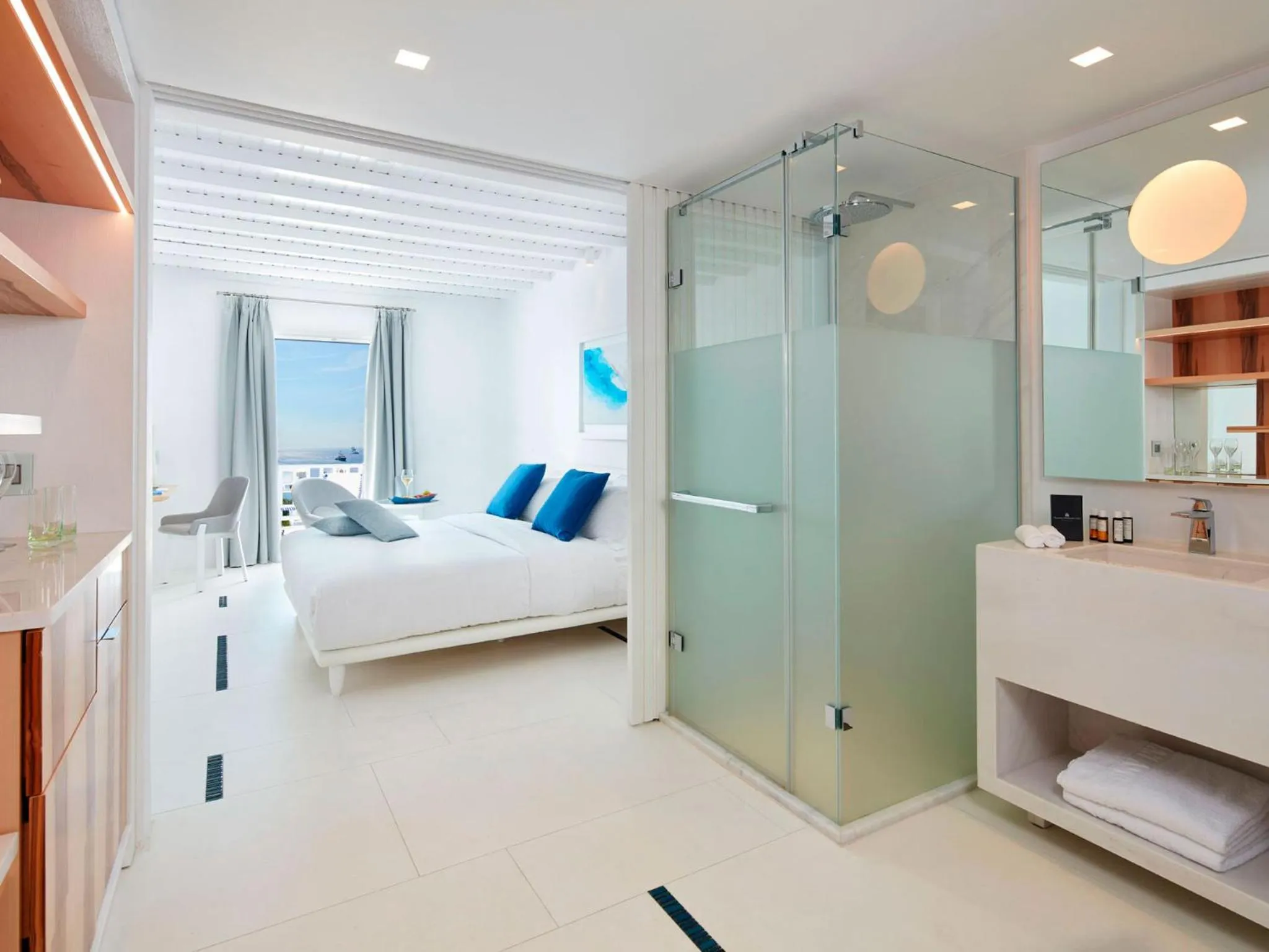 Shower, Bed in Myconian Ambassador Relais & Chateaux